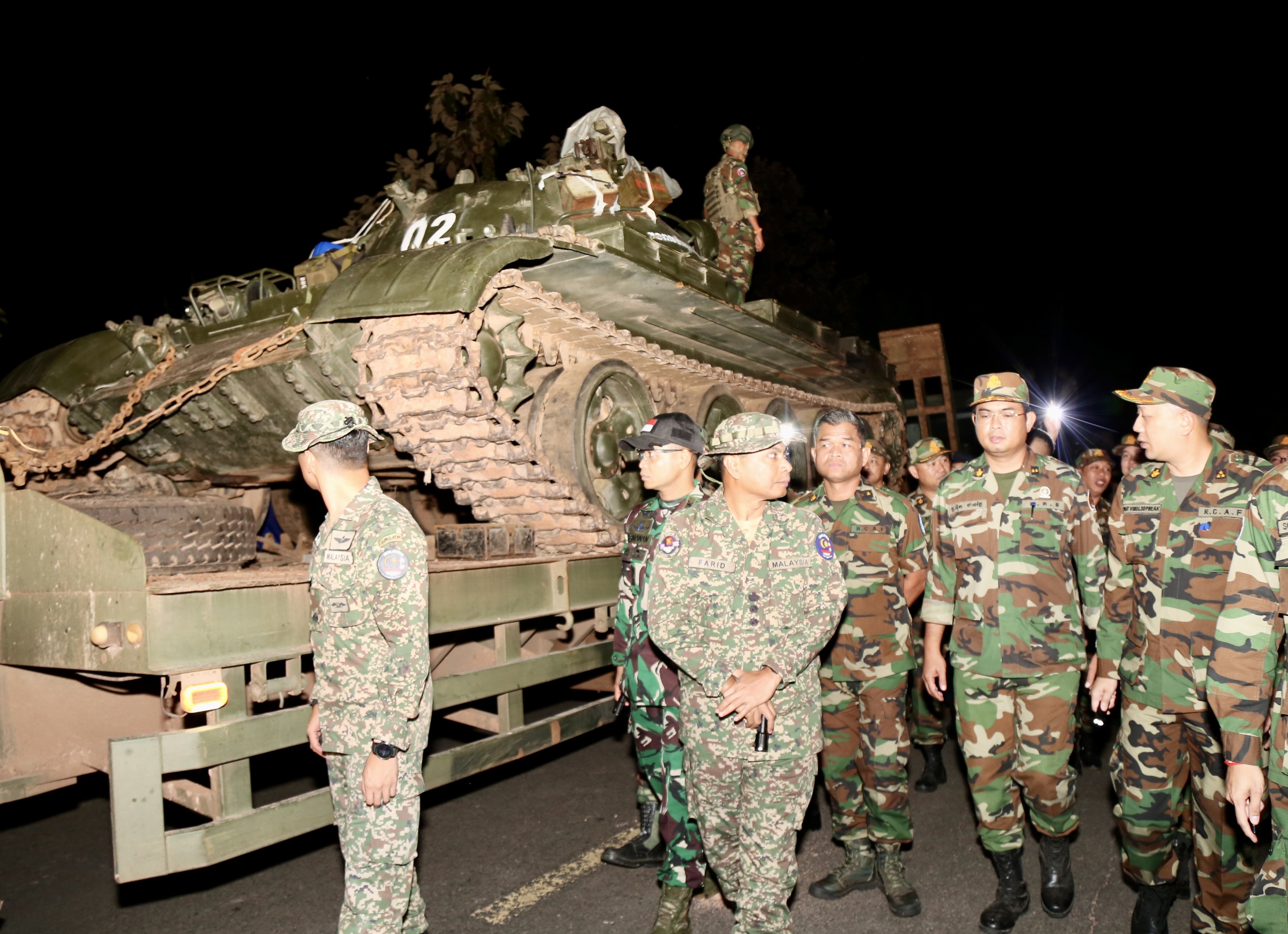 Cambodian soldiers stand on a tank in Preah Vihear province near the border with Thailand. Photo: EPA/Agence Kampuchea Presse