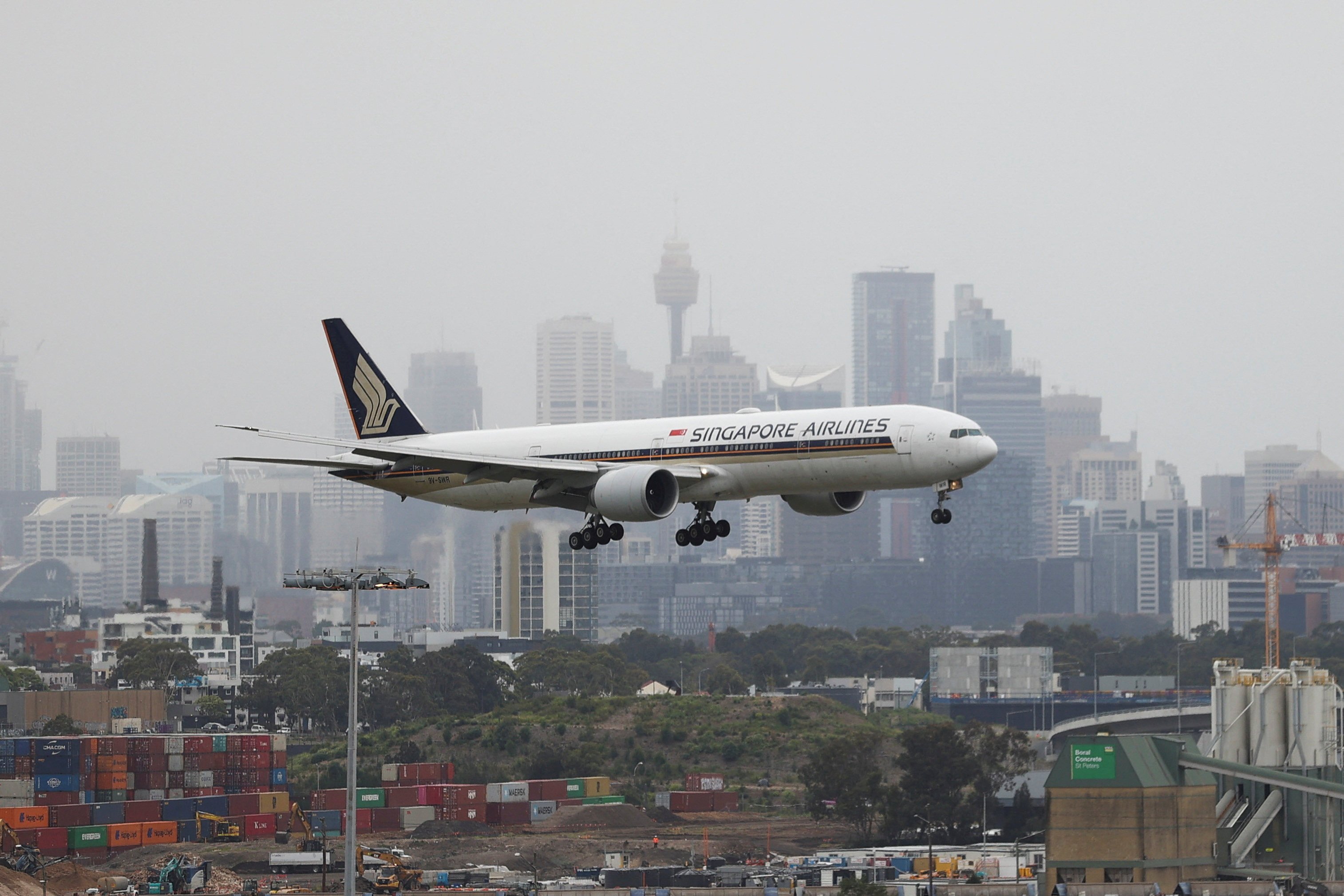 A Singapore Airlines plane arrives at the international terminal at Sydney Airport. Photo: Reuters