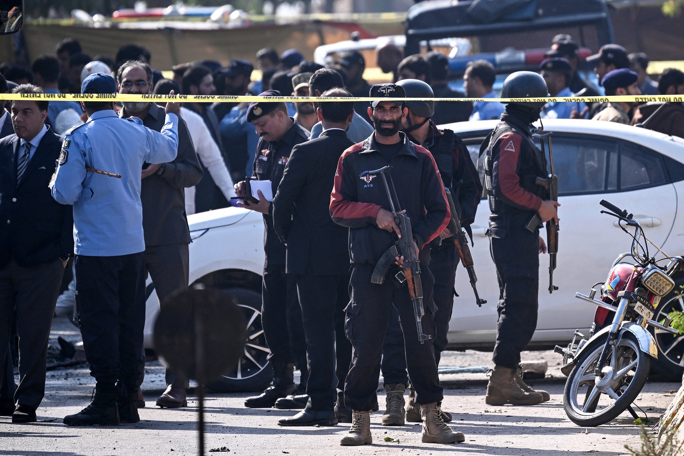 Pakistani counterterrorism commandos stand guard at the site of a suicide blast outside a court in Islamabad on Tuesday. Photo: Getty Images/TNS/AFP