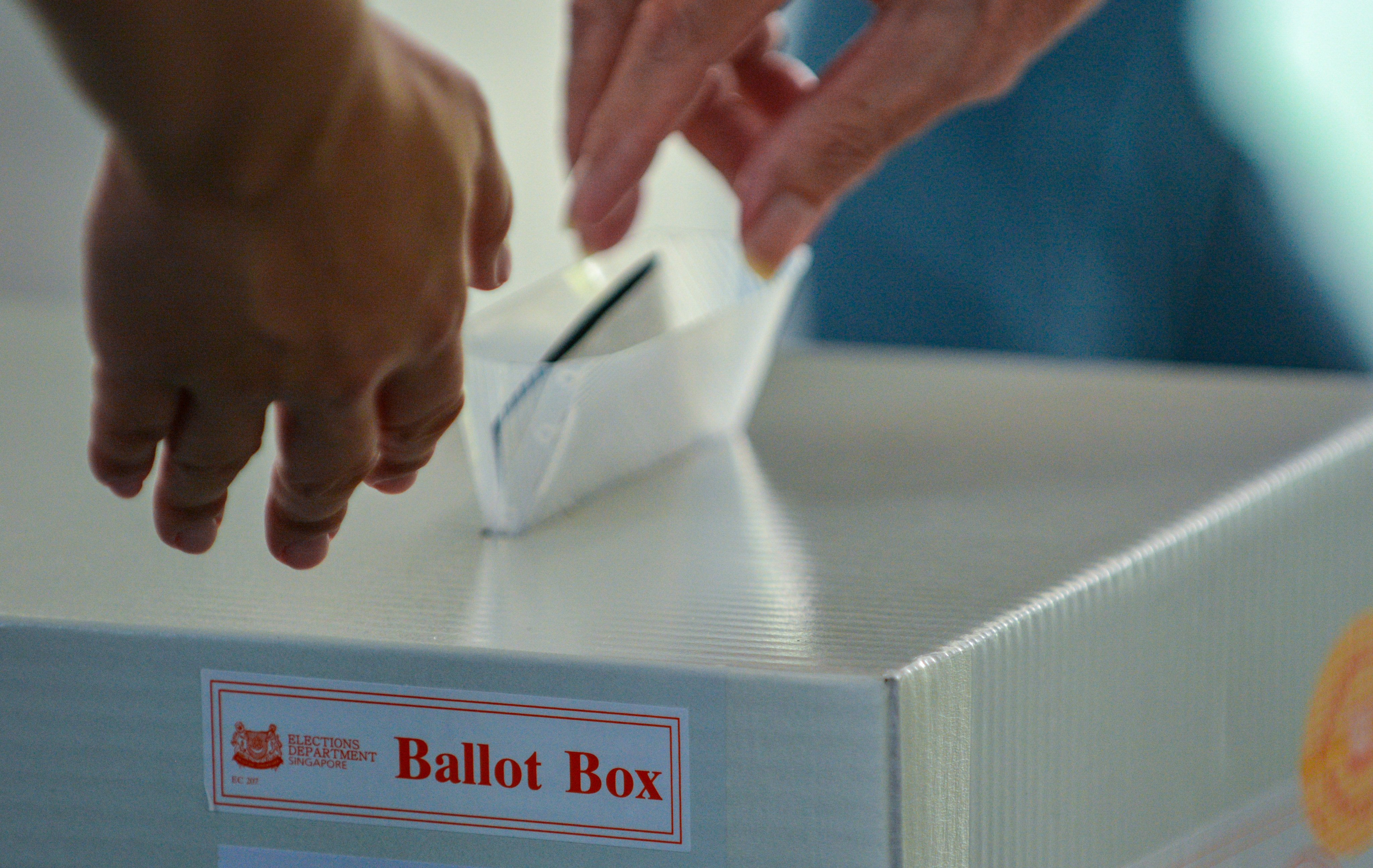 A voter casting a ballot at a polling station in Singapore at the May 3 general election. Photo: EPA-EFE