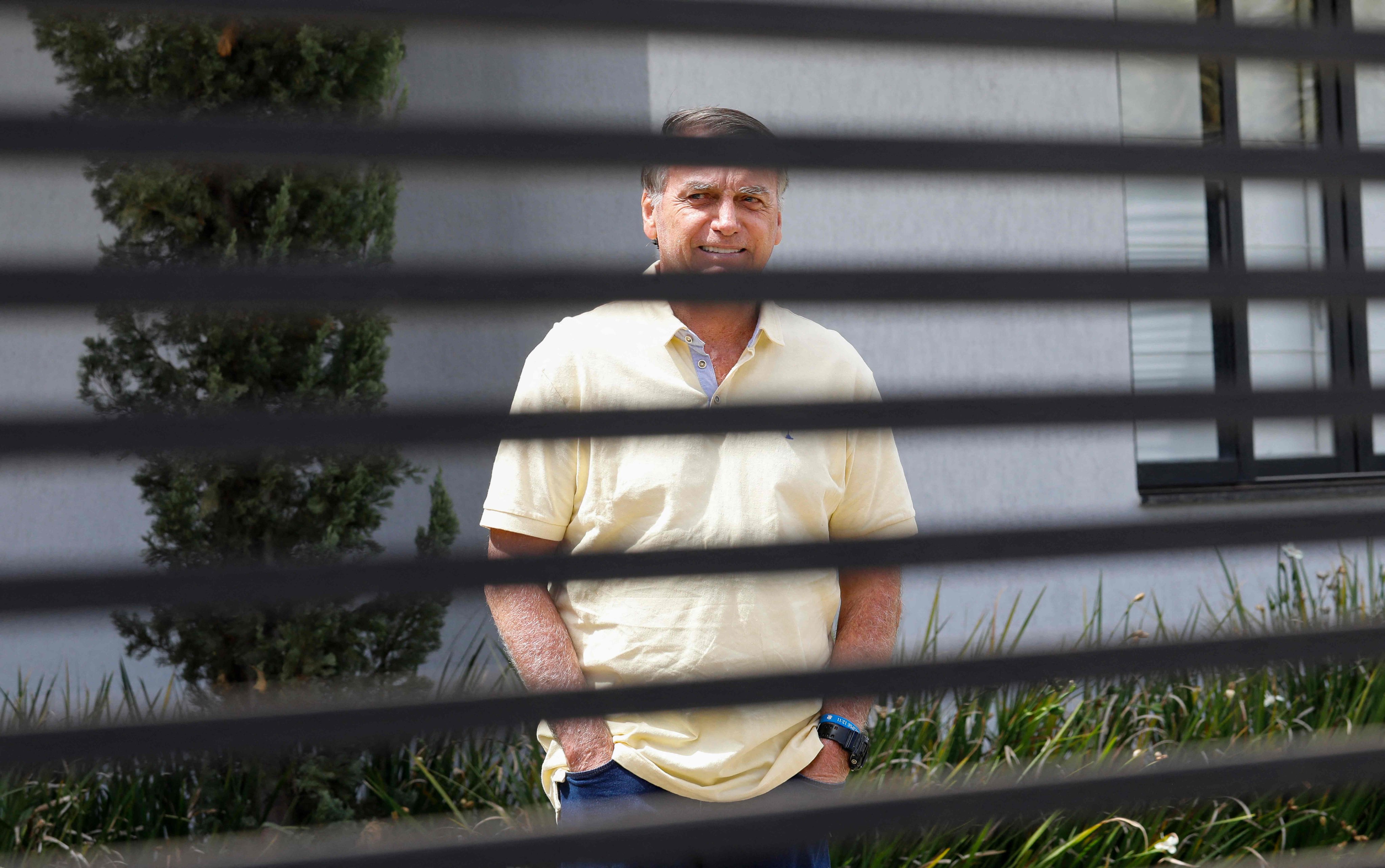 Former Brazilian president Jair Bolsonaro is seen inside his residence in Brasilia, where he has been under house arrest since August. Photo: AFP