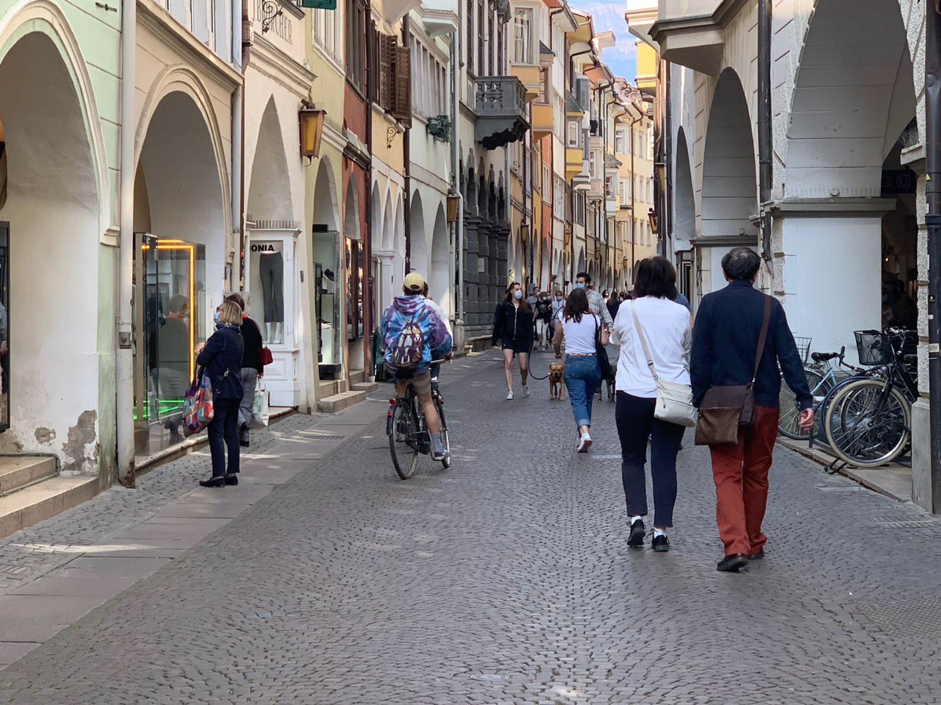 People at a street in Bolzano, capital of the South Tyrol region. Italy’s northernmost province is a particularly popular holiday destination for German and Austrian tourists. Photo: EPA-EFE