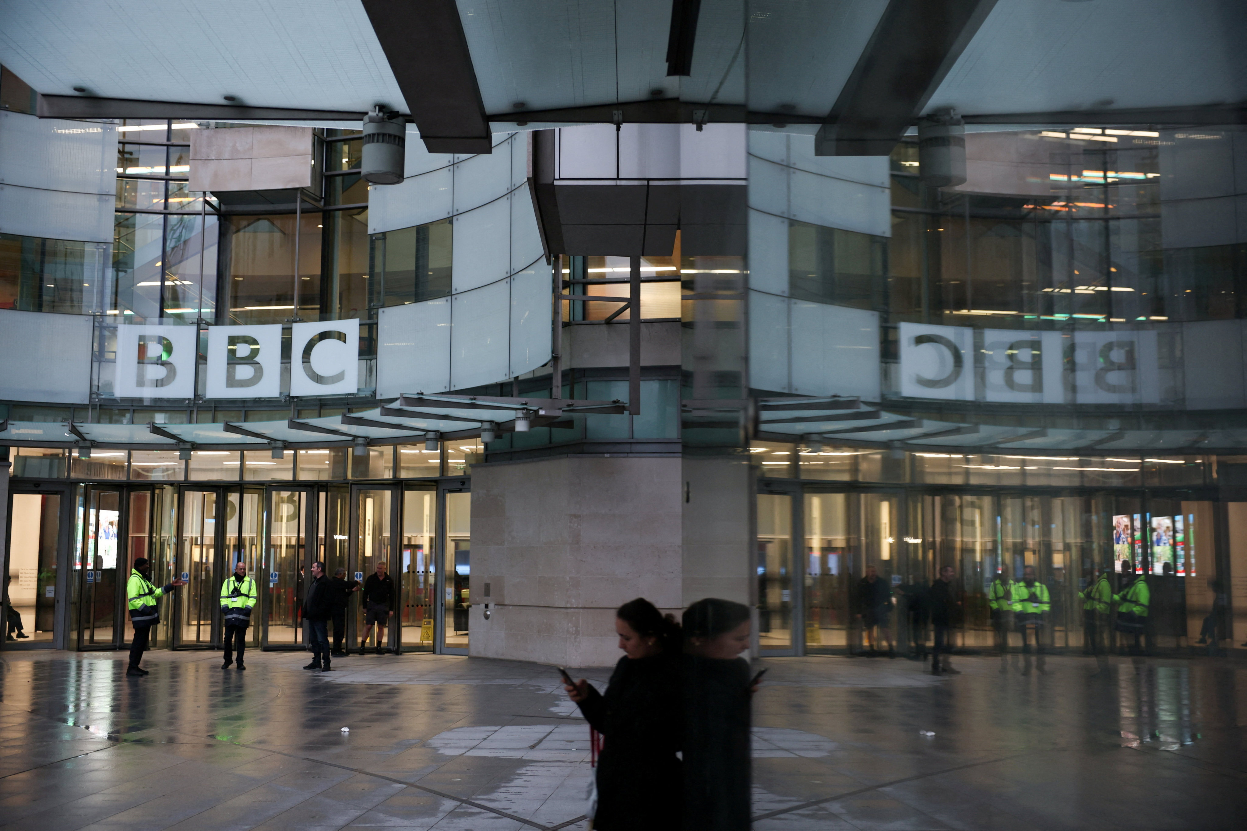 Security guards stand outside BBC’s Broadcasting House on Friday. Photo: Reuters