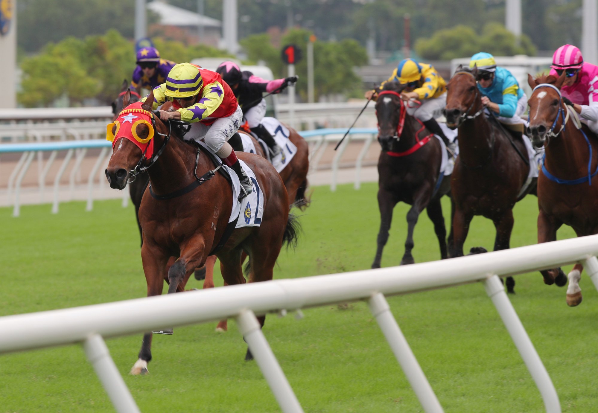 Crimson Flash surges clear to score under Andrea Atzeni.
