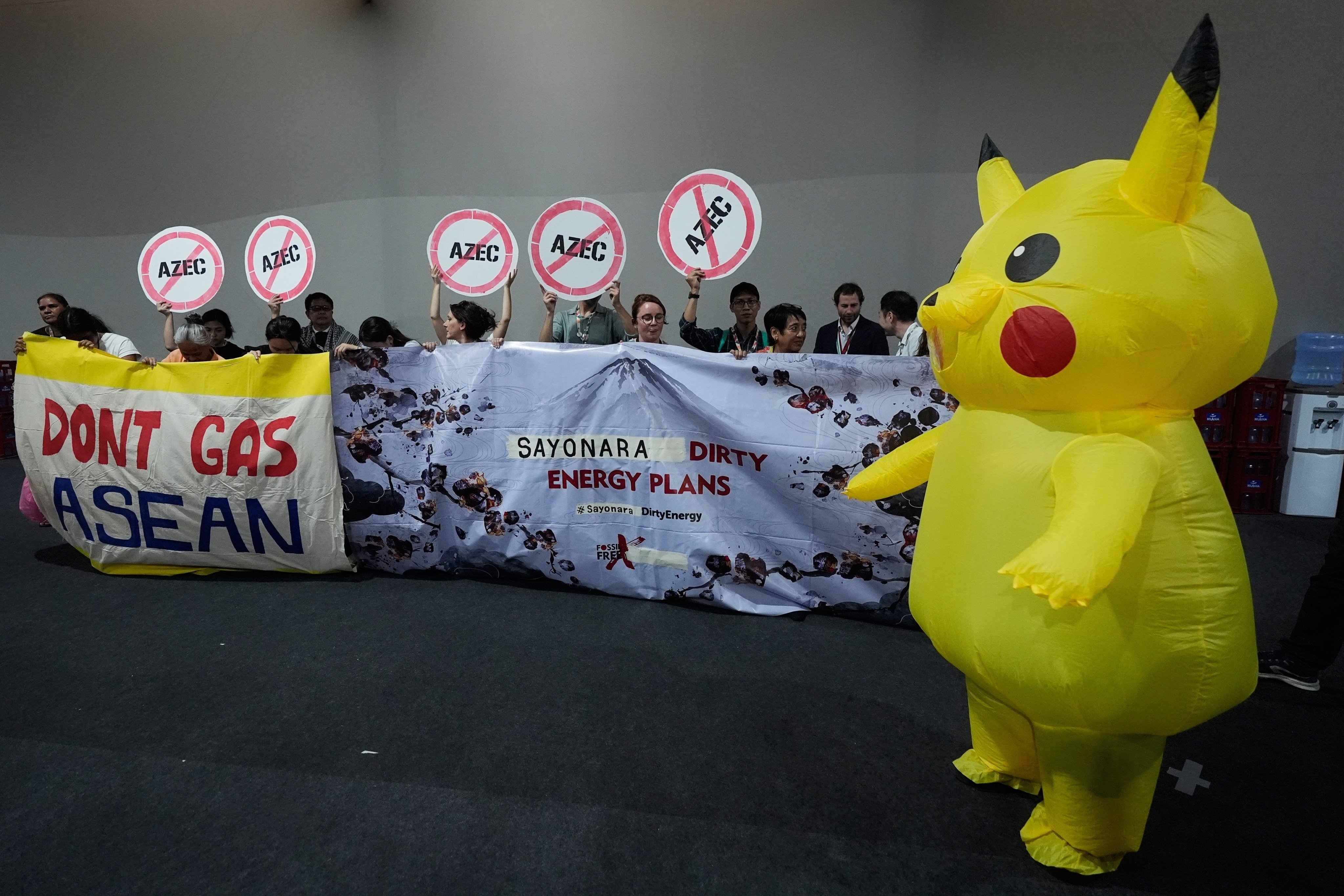 An activist in a Pikachu costume joins the protest against Japan’s financing of coal and natural gas projects during the Cop30 UN climate summit on Friday. Photo: AP