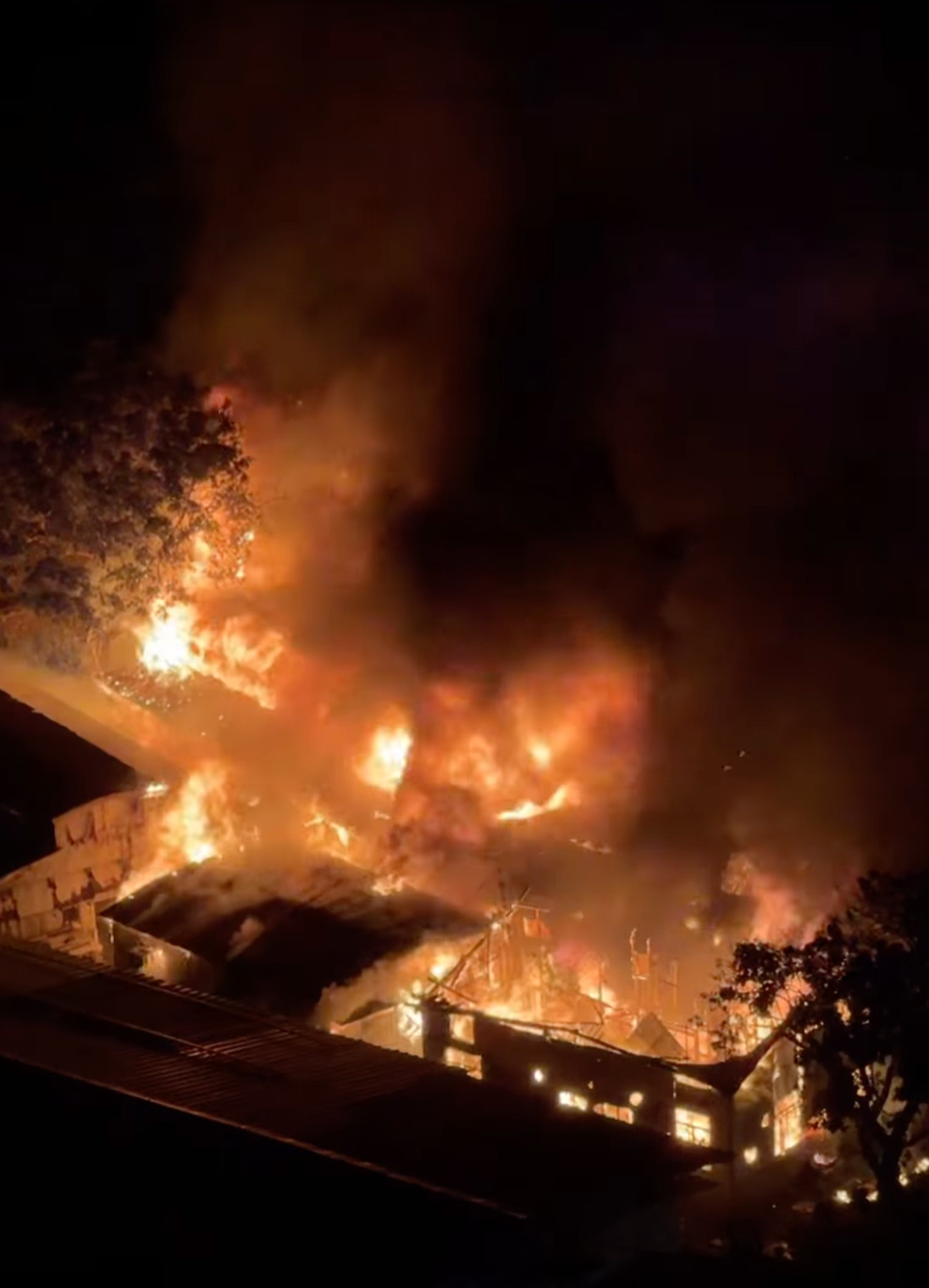 A 67-year-old man was injured after a corrugated iron house in Ping Kong Village, Sheung Shui, caught fire. Photo: Handout
