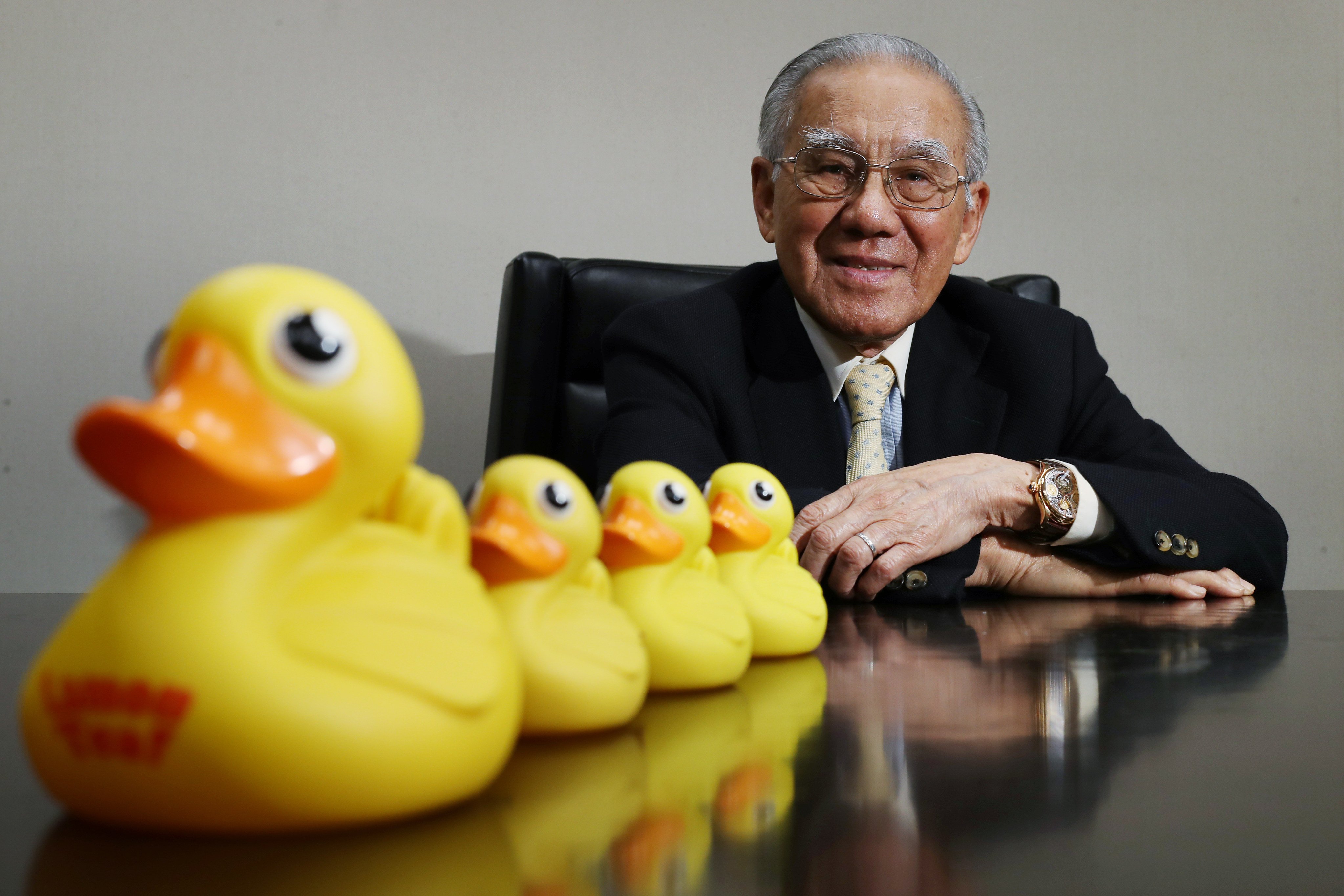 Hong Kong toy tycoon Lam Leung-tim with his iconic rubber ducks in 2017. Photo: Nora Tam
