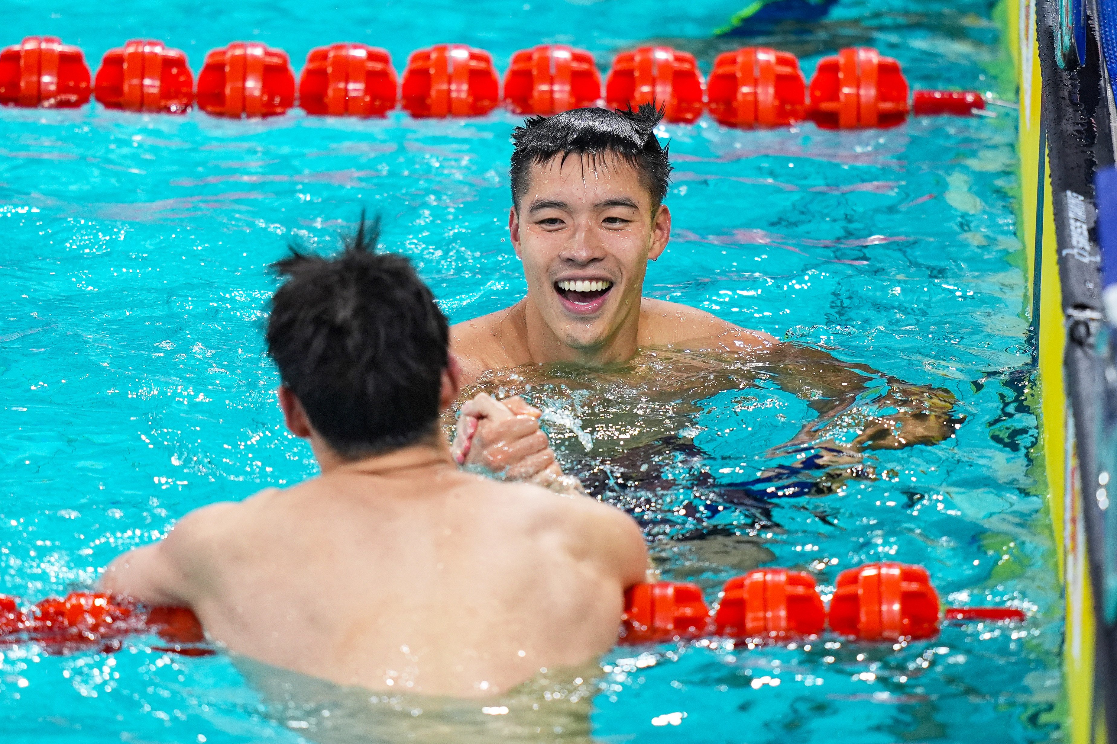 Hong Kong swimmer Ian Ho Yentou bags the men’s 50m freestyle gold medal storming to the wall in first place in 21.71 seconds. Photo: Xinhua