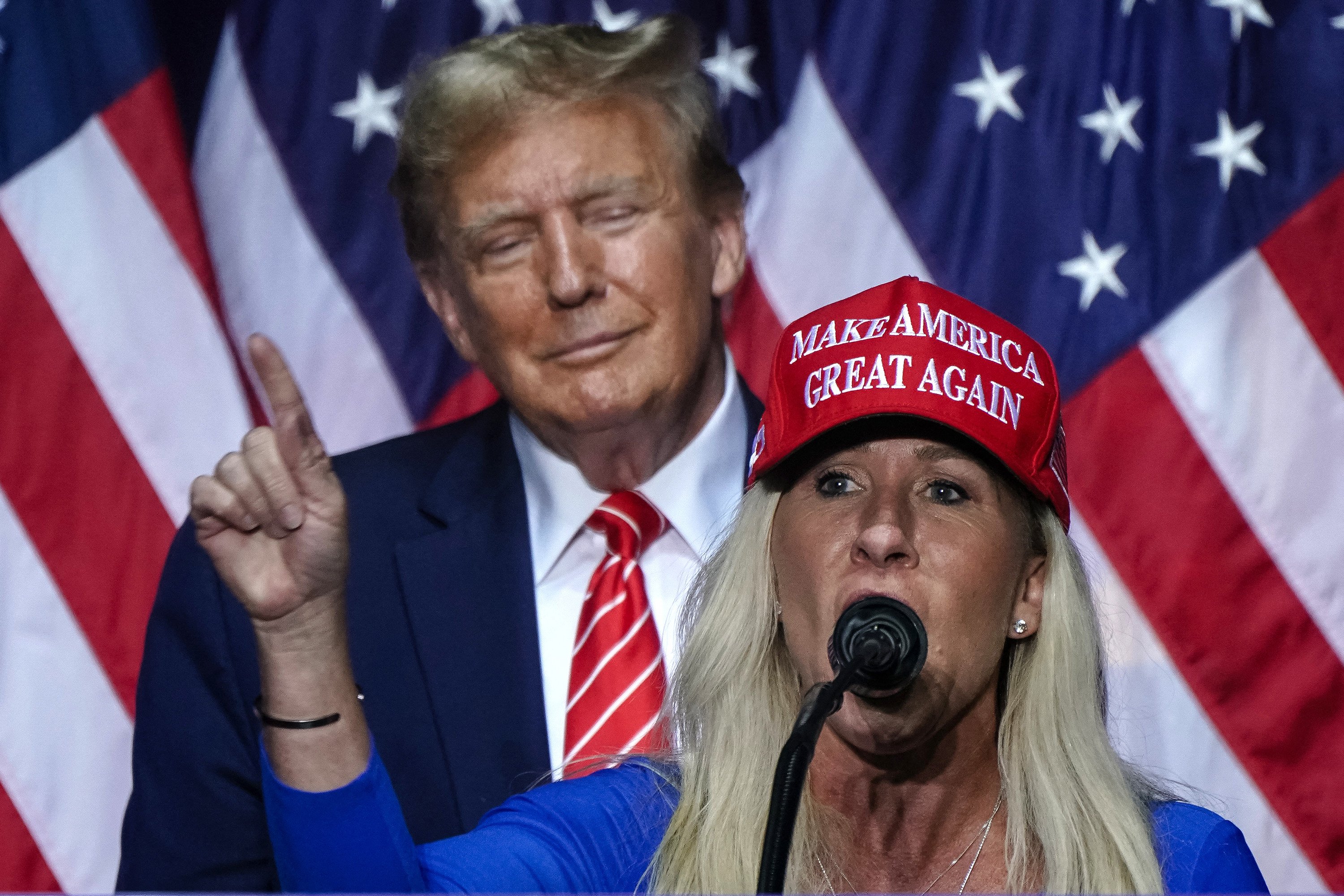 US congresswoman Marjorie Taylor speaks alongside Donald Trump at a campaign event in Rome, Georgia,  in March 2024. Photo: TNS