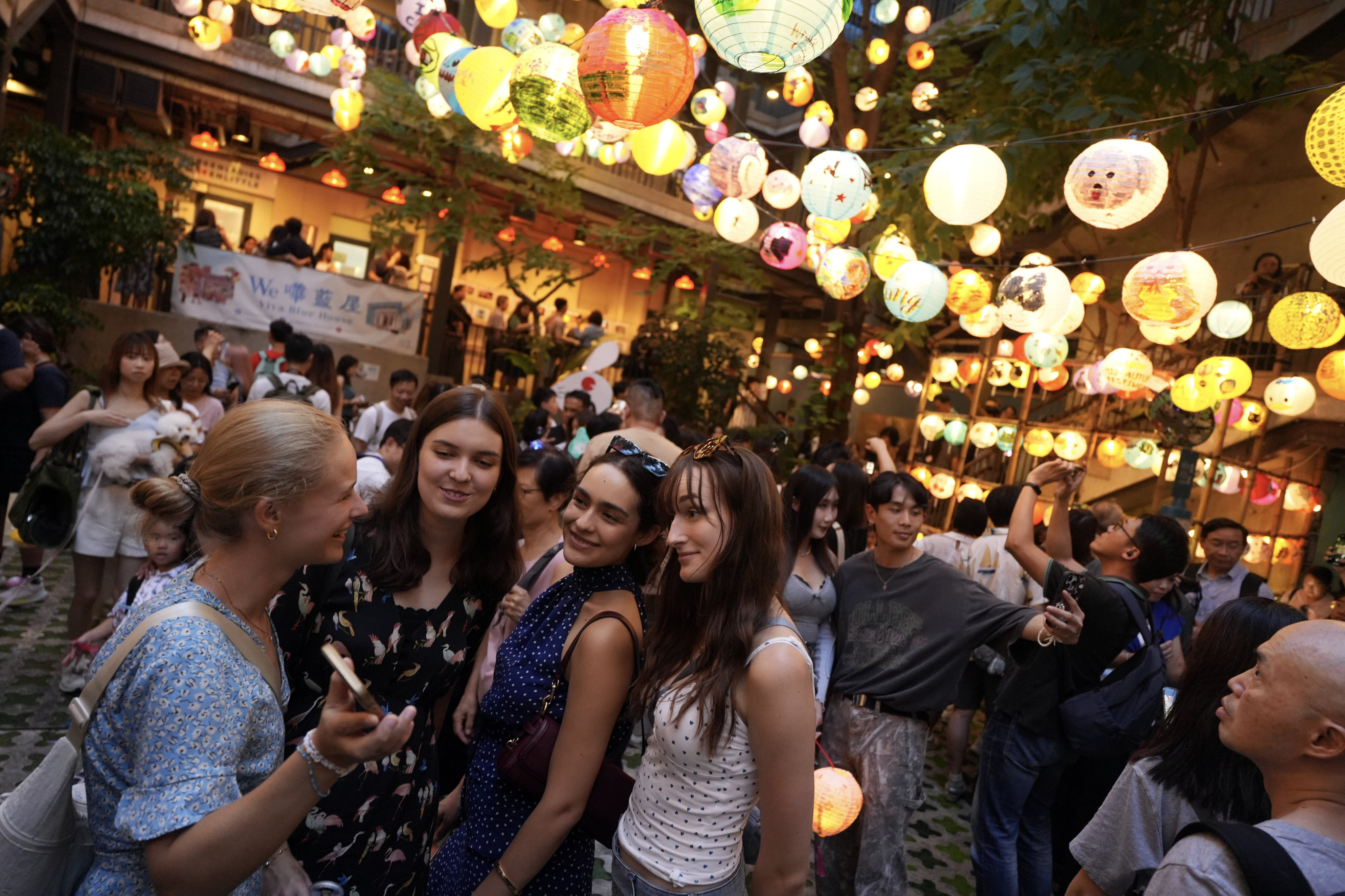 Tourists gather at the Blue House Cluster in Wan Chai for the Mid-Autumn Festival. Hong Kong welcomed 9.62 million foreign tourists in the first 10 months of 2025. Photo: Sun Yeung
