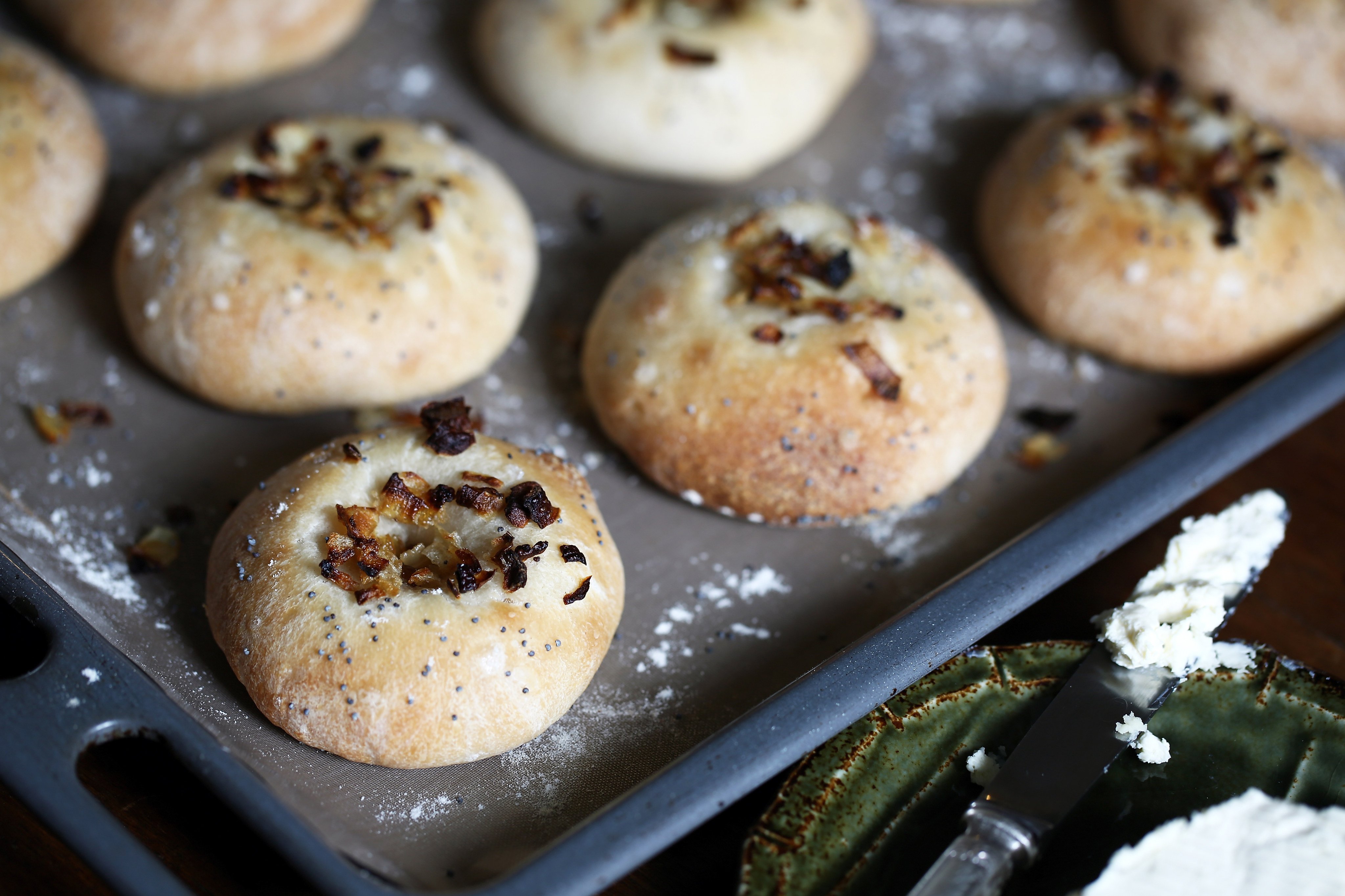 Onion and poppy seed platzels, or bialys. Photo: Jonathan Wong