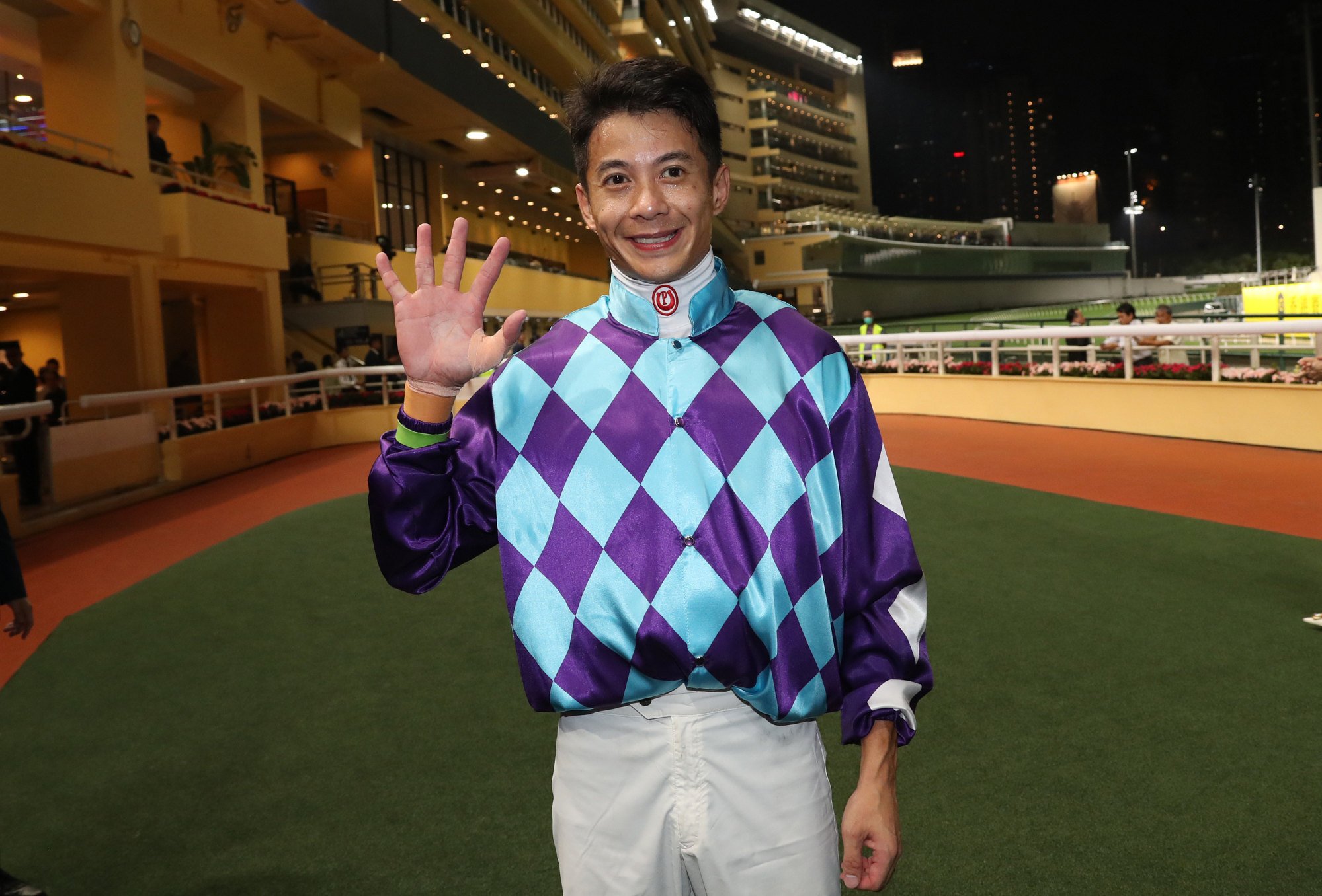 Derek Leung celebrates his 500th career victory last month.