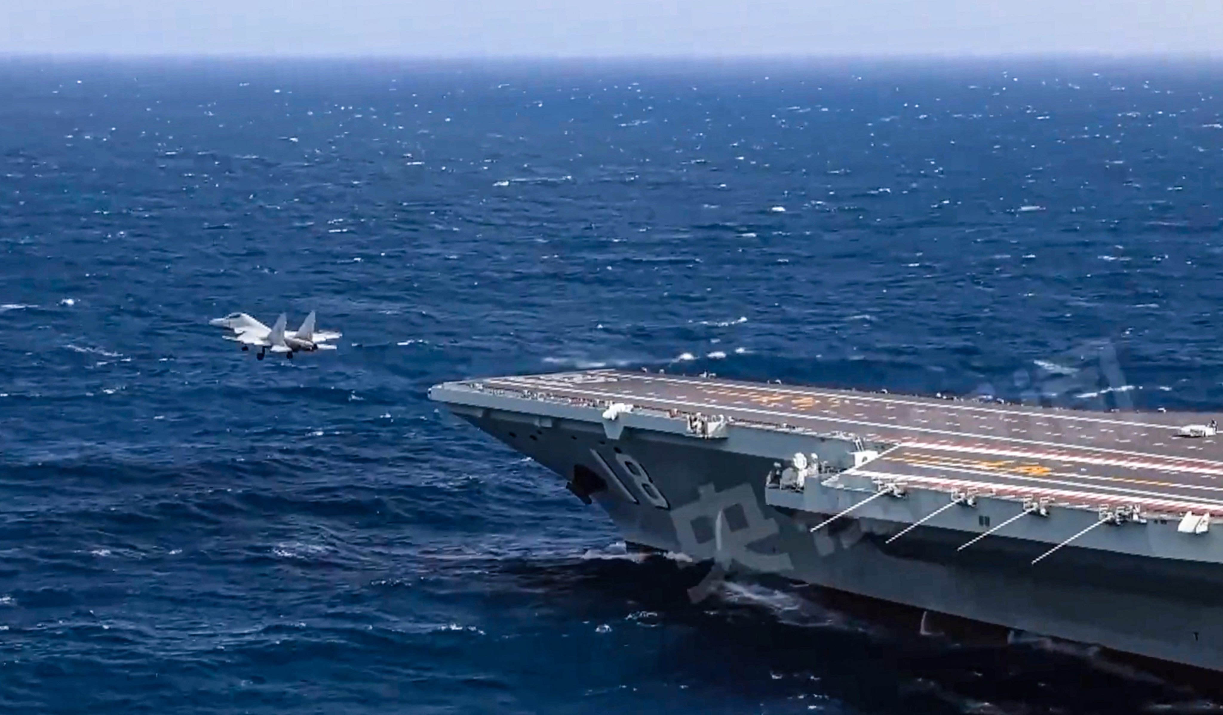 The Fujian practised multiple catapult launches and arrested landings with its ship-based aircraft, according to state media. Photo: CCTV