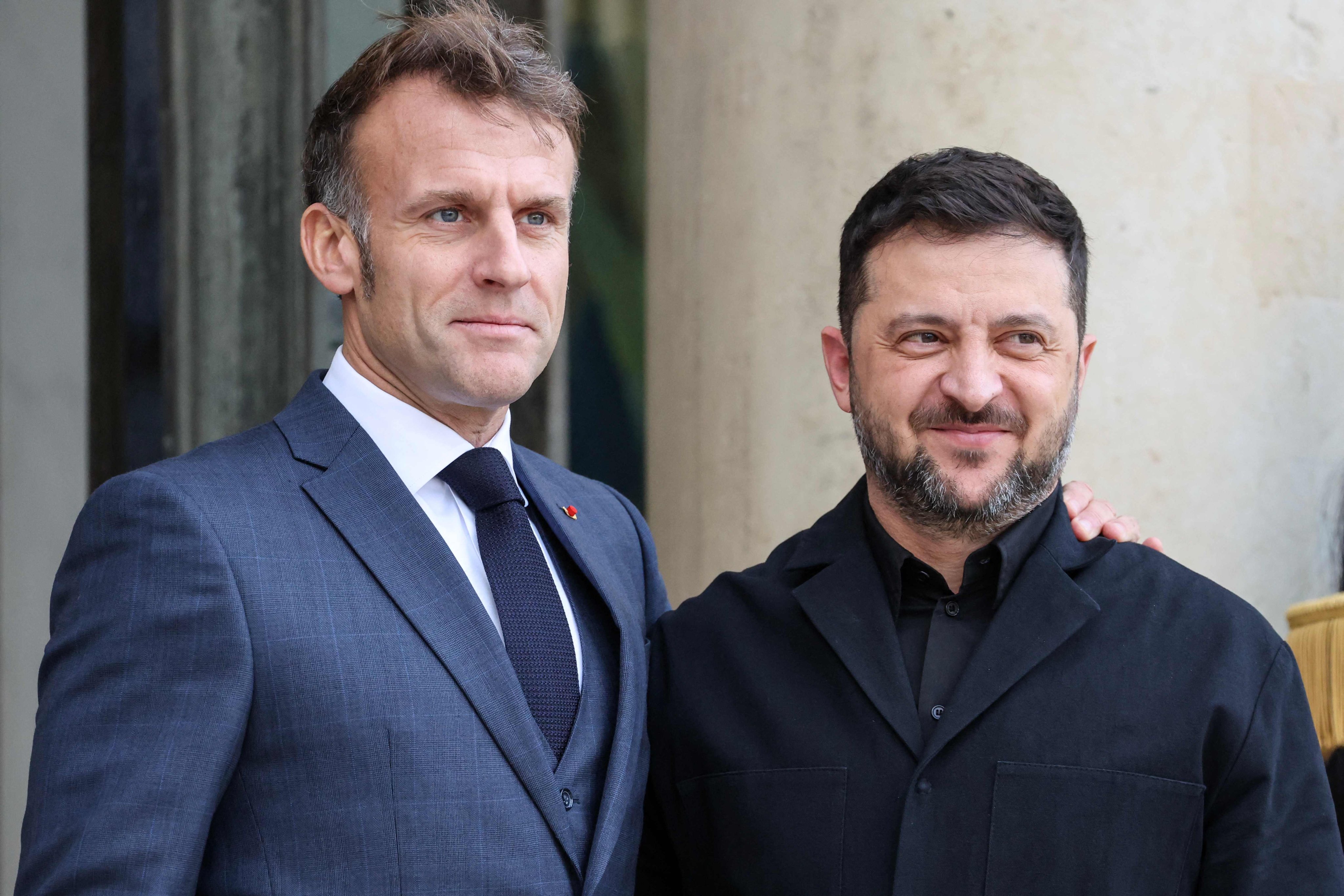 France’s President Emmanuel Macron (left) welcomes Ukraine’s President Volodymyr Zelensky before their meeting at the Elysee Palace in Paris on Monday. Photo: AFP