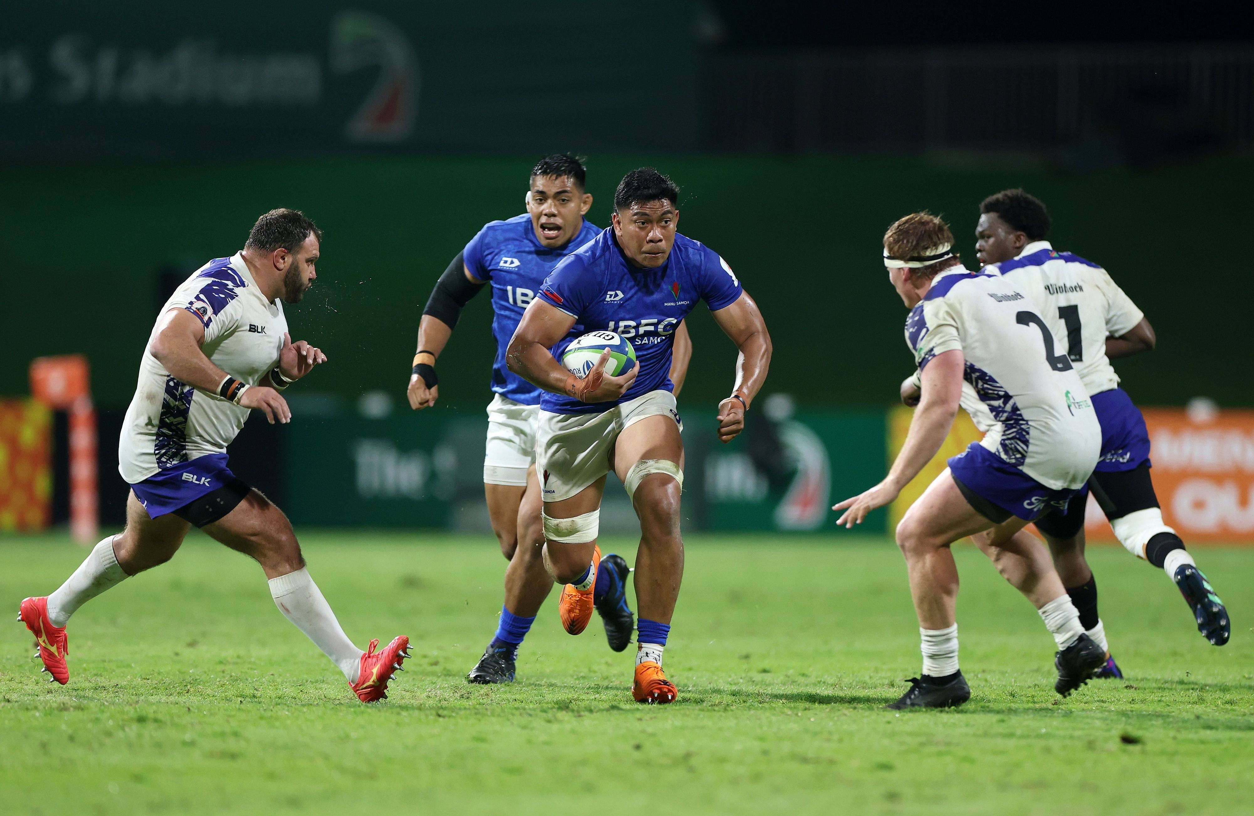 Miracle Fai’ilagi of Samoa on the charge against Namibia during the final qualification tournament in Dubai. Photo: World Rugby via Getty Images
