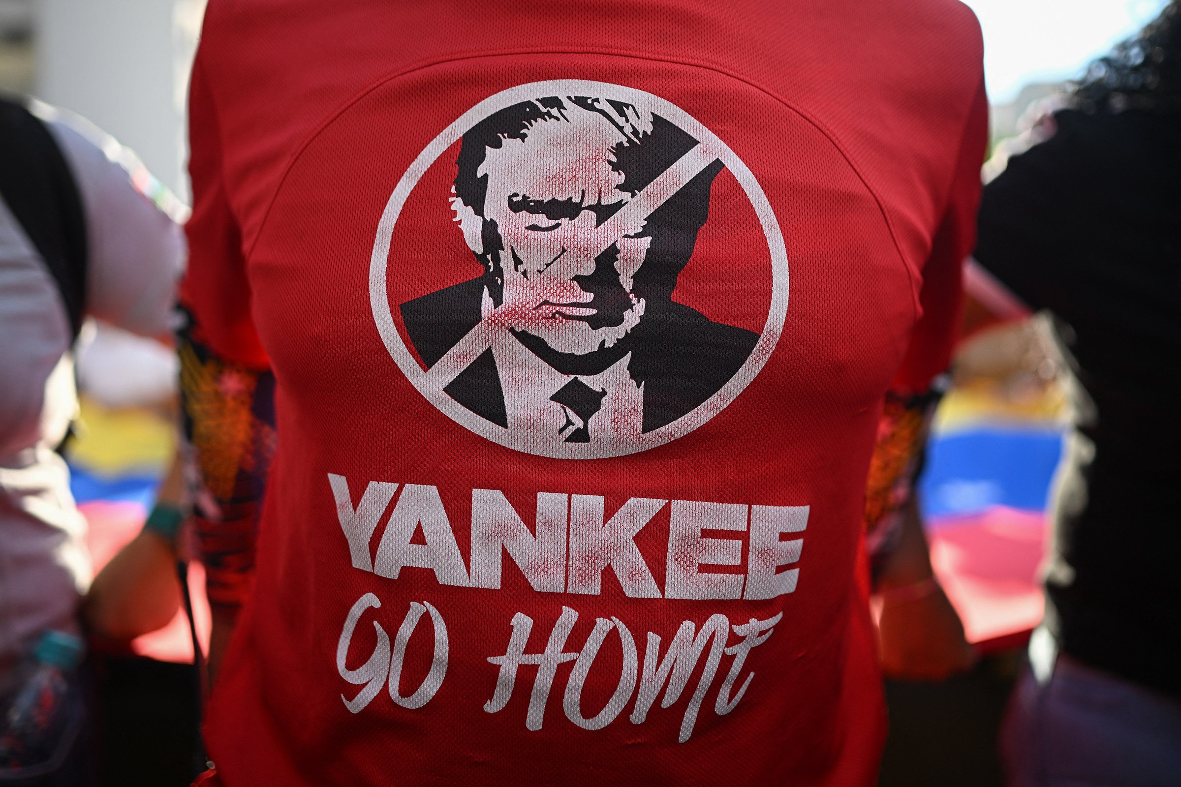 A T-shirt worn by a Maduro supporter at a rally against US military activity in the Caribbean, in the Venezuelan capital of Caracas on October 30. Photo: AFP via Getty Images/TNS