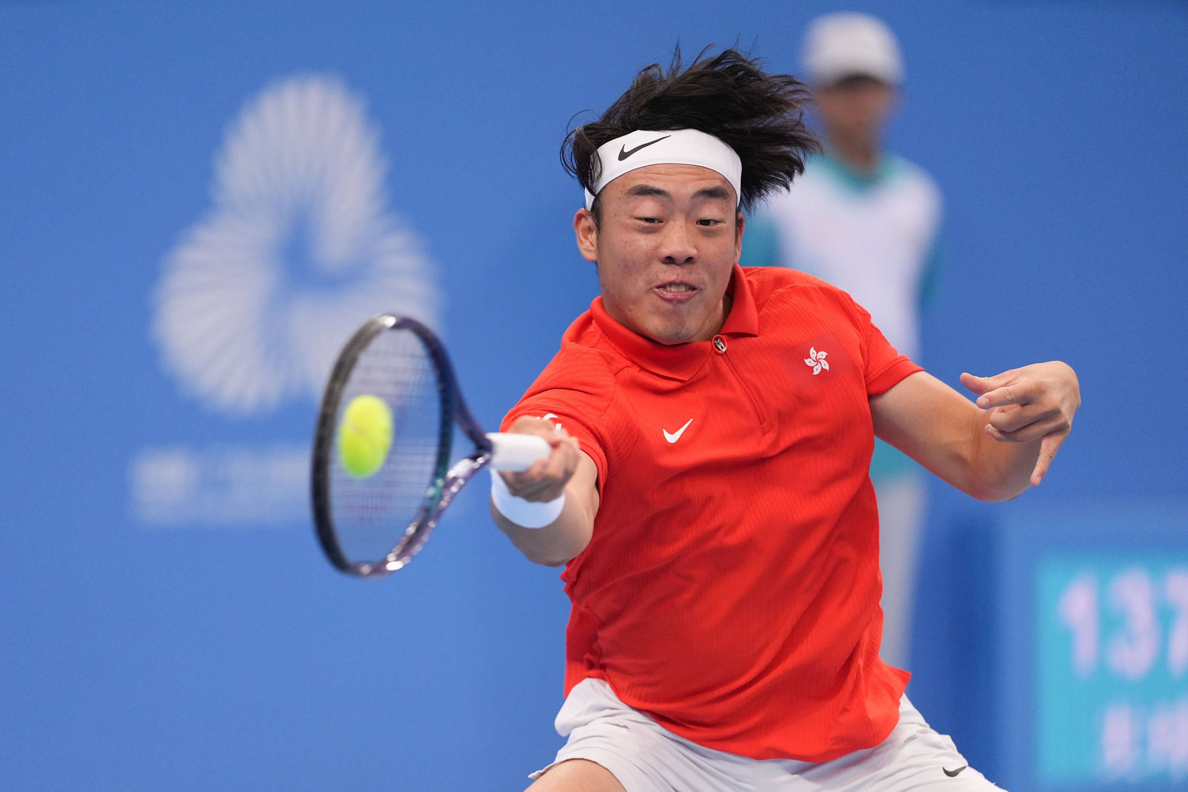 Coleman Wong hits a return during his men’s singles semi-final against Wu Yibing. Photo: Eugene Lee
