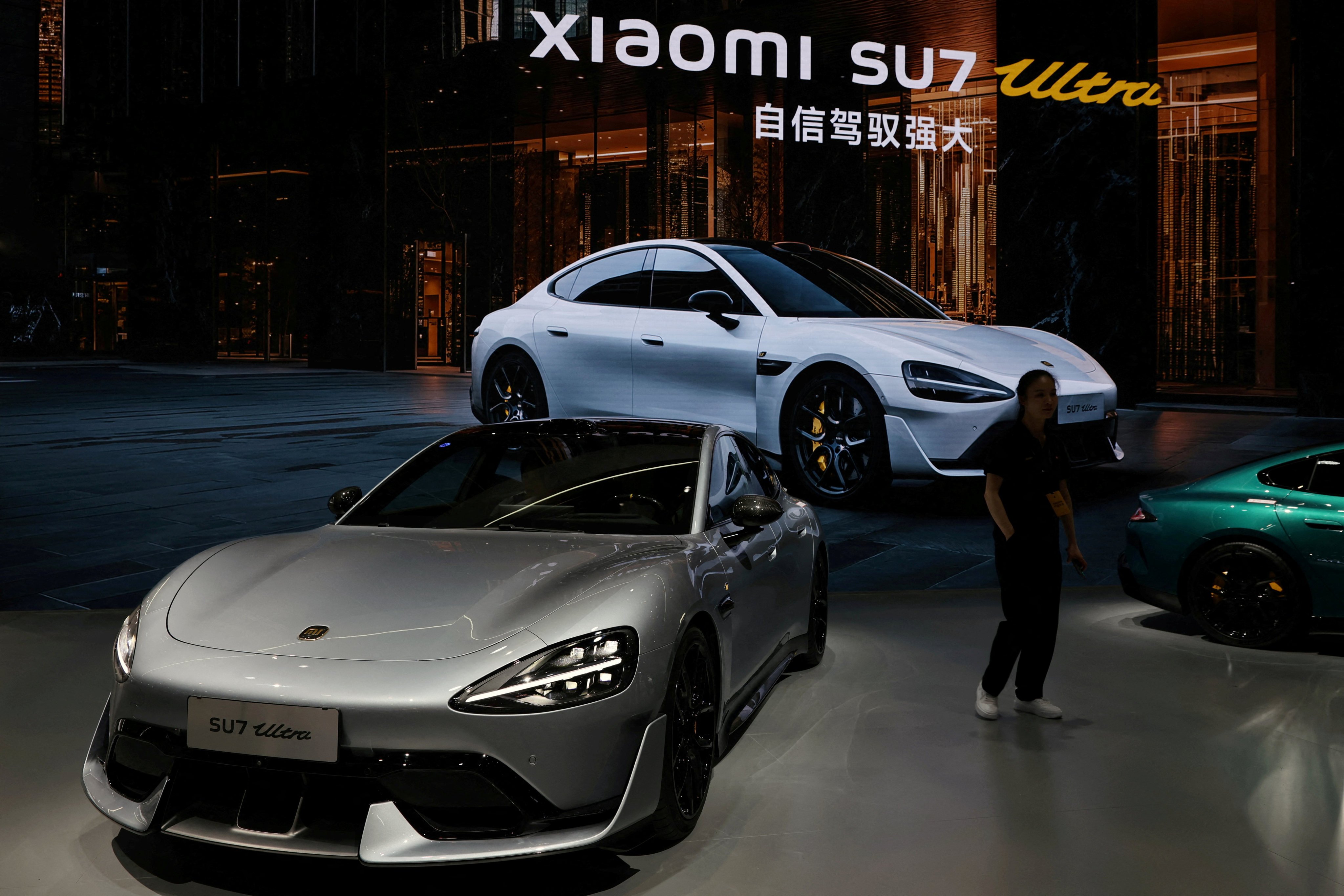 Xiaomi’s SU7 Ultra EVs are displayed at the Auto Shanghai exhibition in April 2025. Photo: Reuters