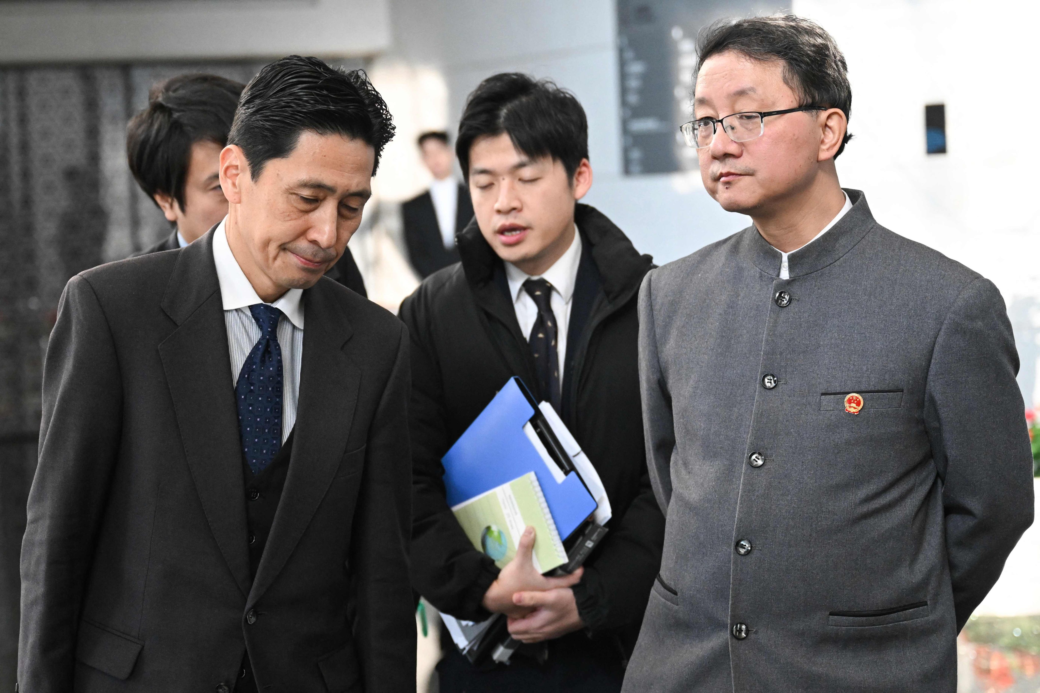 Talks between Masaaki Kanai (left) and Liu Jinsong ended without consensus. Photo: AFP