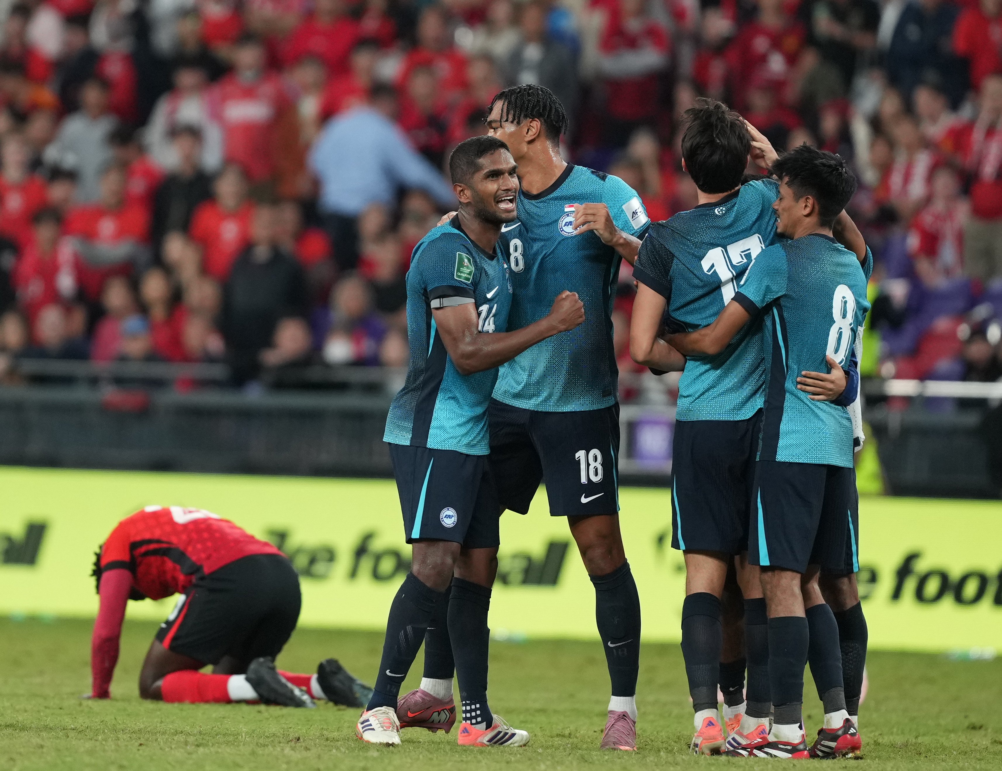 Singapore’s players celebrate for their victory after the Asian Cup 2027 Qualifiers match against Hong Kong at Kai Tak Stadium. Photo: Sam Tsang