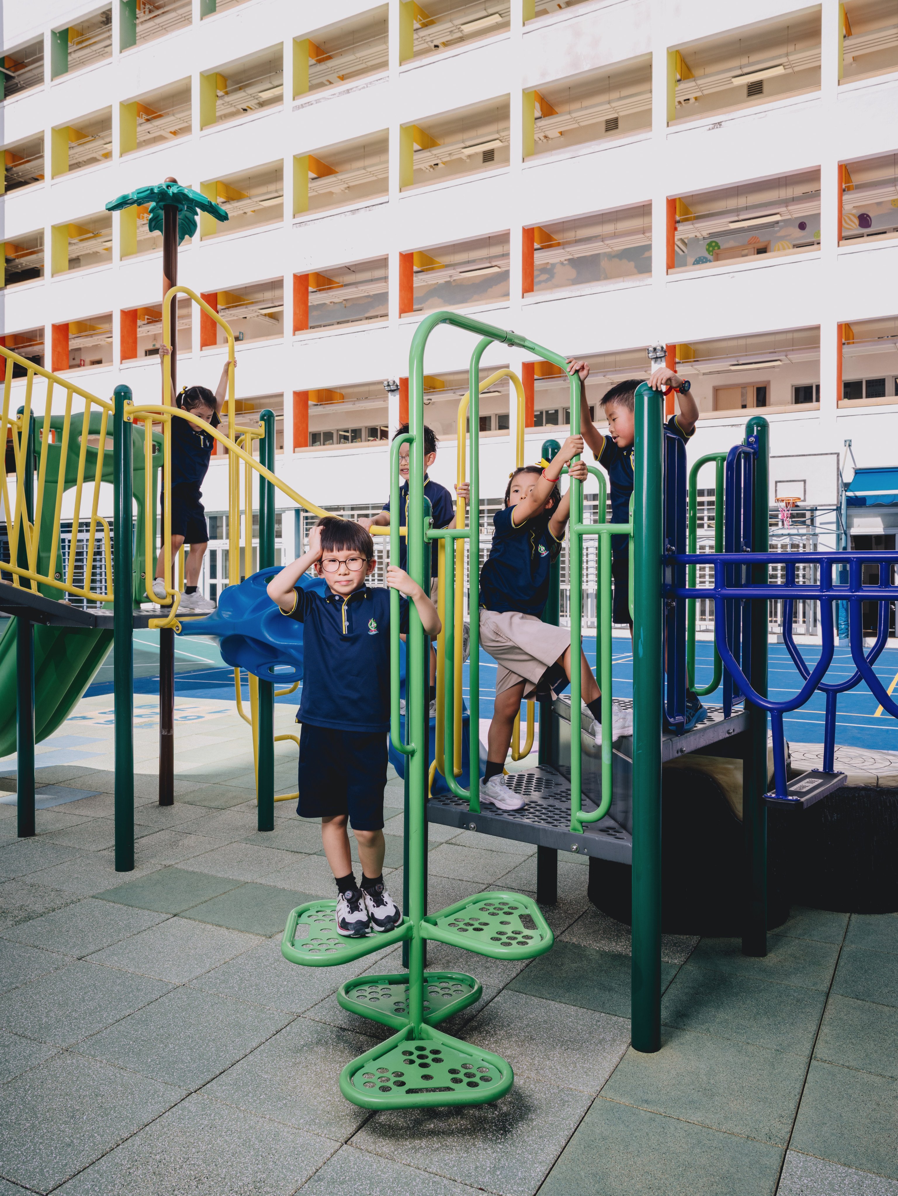 Pupils clamber on climbing equipment at the Christian Alliance P.C. Lau Memorial International School in Hong Kong. Photo: Jocelyn Tam
