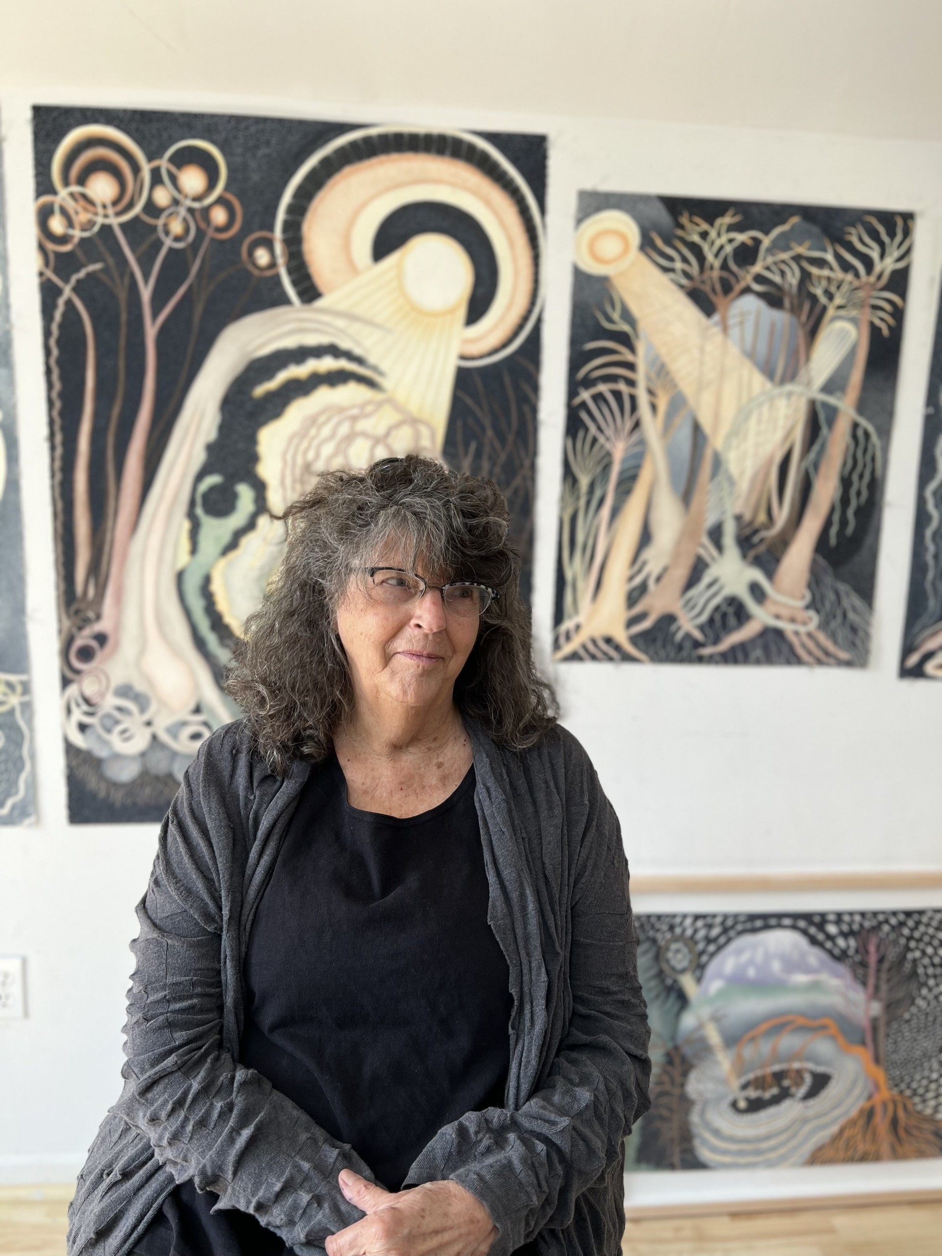Ann Leda Shapiro sits in front of paintings in her studio on Vashon Island, in the US state of Washington. The artist’s first solo exhibition in Asia, “Ann Leda Shapiro: Body is Landscape”, is being held at the Axel Vervoordt Gallery in Wong Chuk Hang, Hong Kong. Photo: Axel Vervoordt Gallery Hong Kong