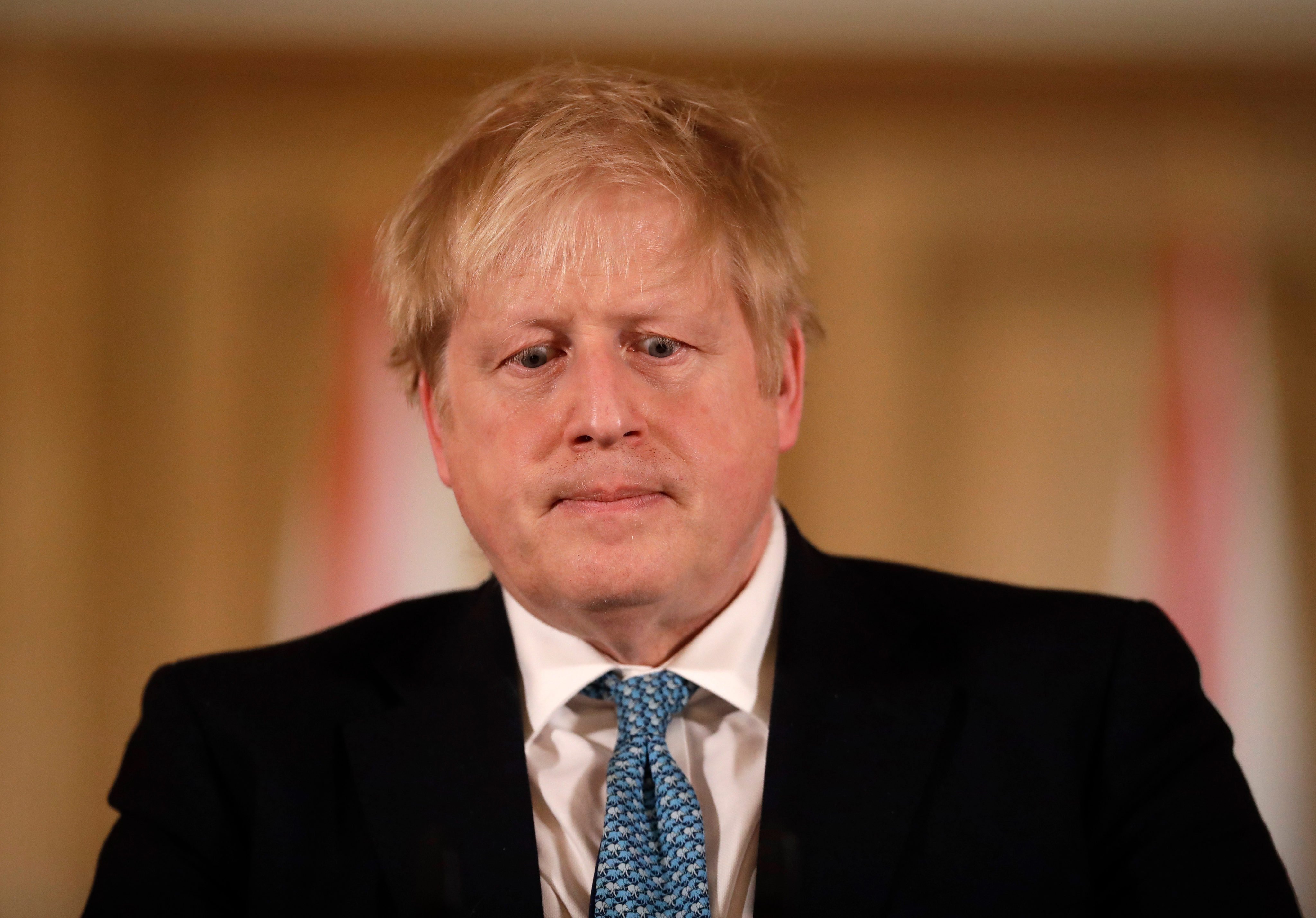 Then UK Prime Minister Boris Johnson gives a news conference about the ongoing situation with the coronavirus outbreak inside 10 Downing Street in London in 2020. Photo: AP