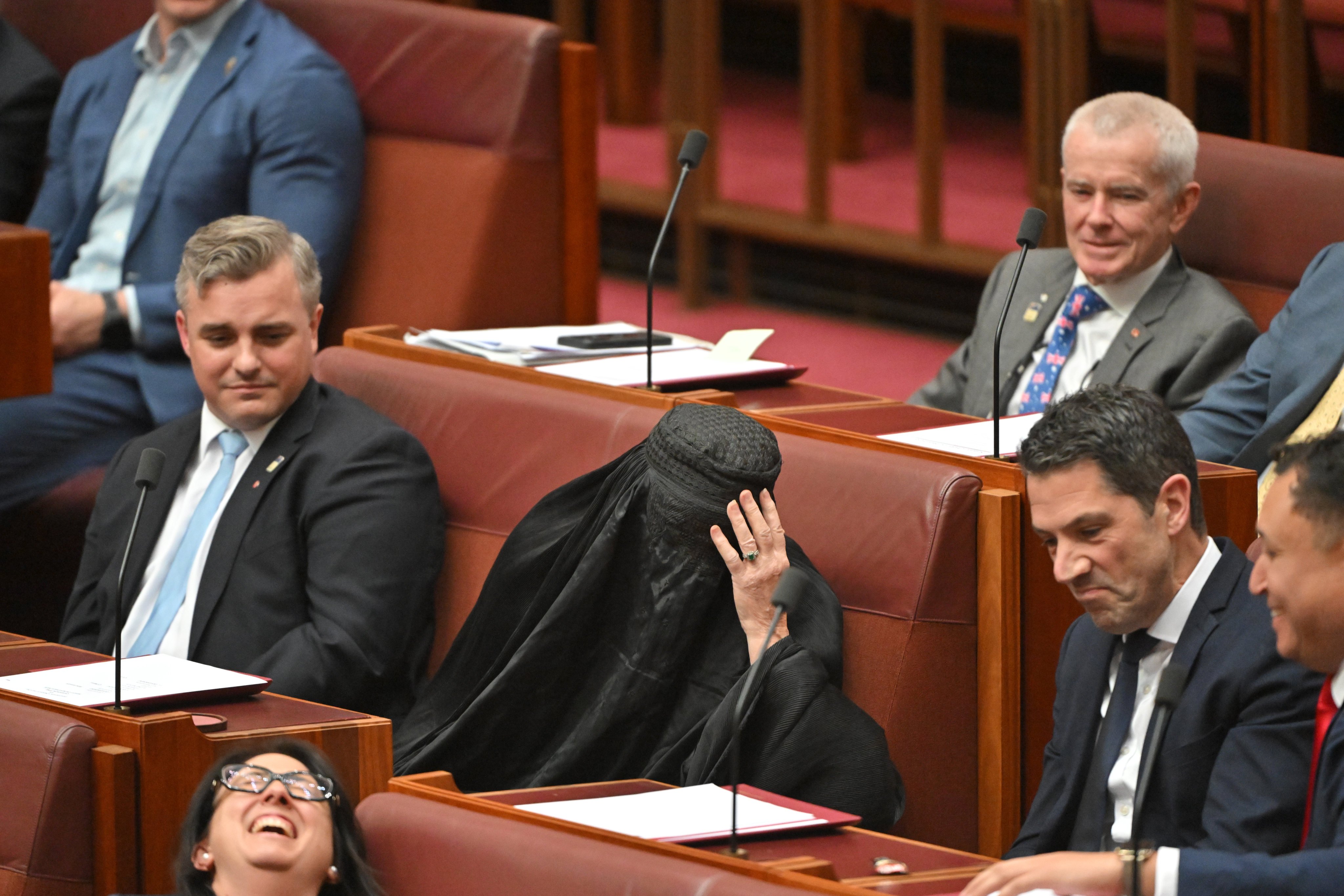Pauline Hanson (center) wears a burka into the senate chamber on Monday. Photo: dpa