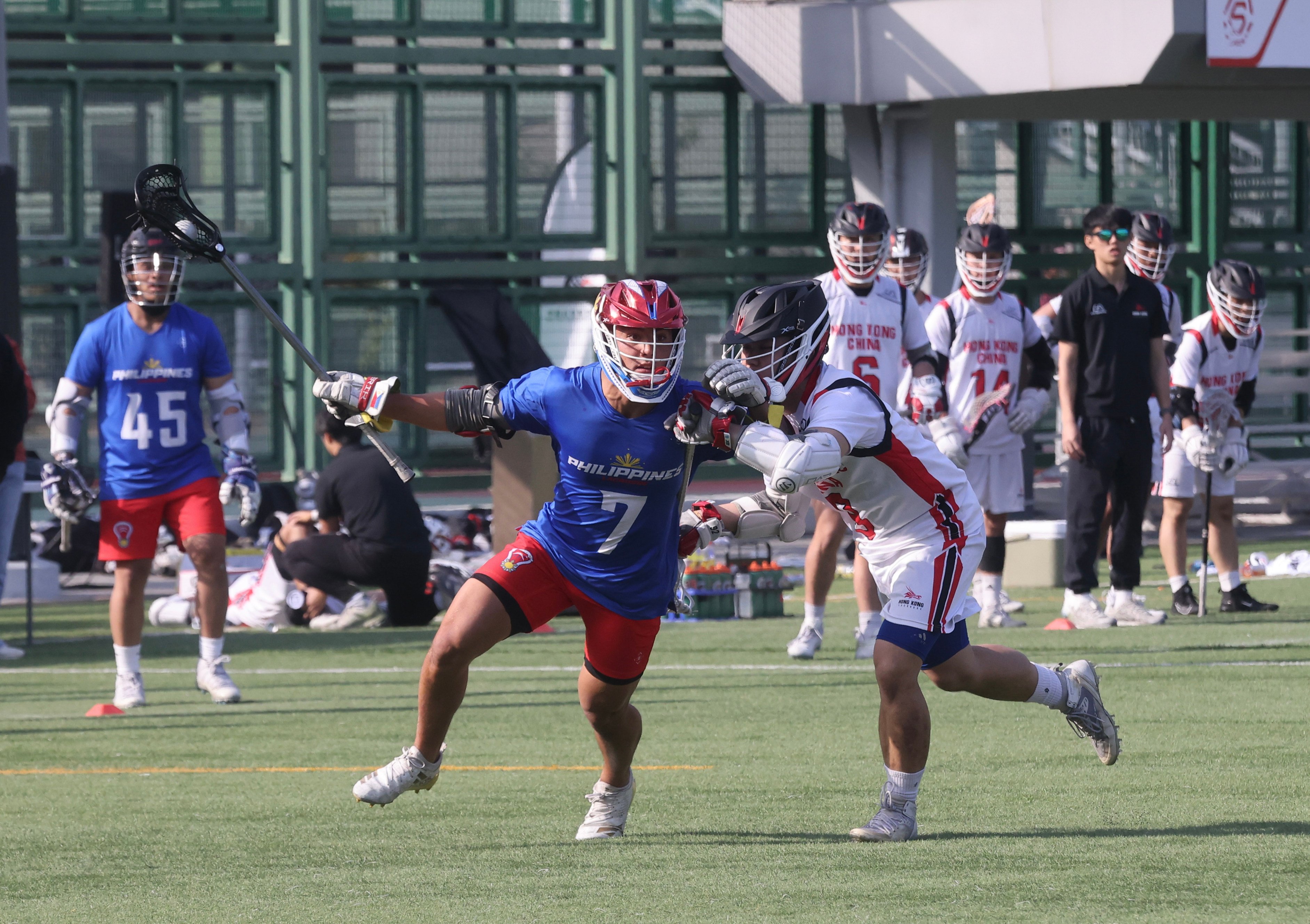 Hong Kong’s Lai Kwok-wang (in white) challenges Jon Dugenio of the Philippines during last year’s Super Sixes at Wong Chuk Hang Sports Ground. Photo: Jonathan Wong