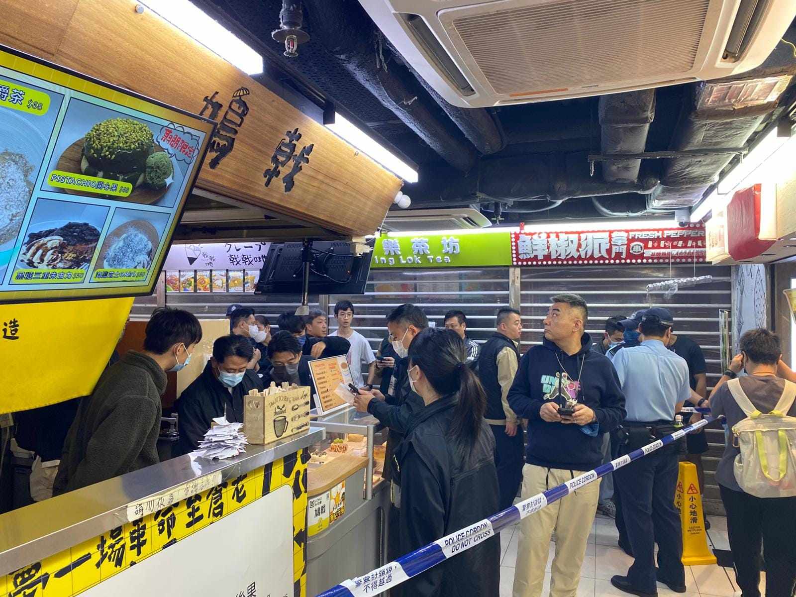 Police searched the suspects shop and reportedly took away a male staff member. Photo: Handout