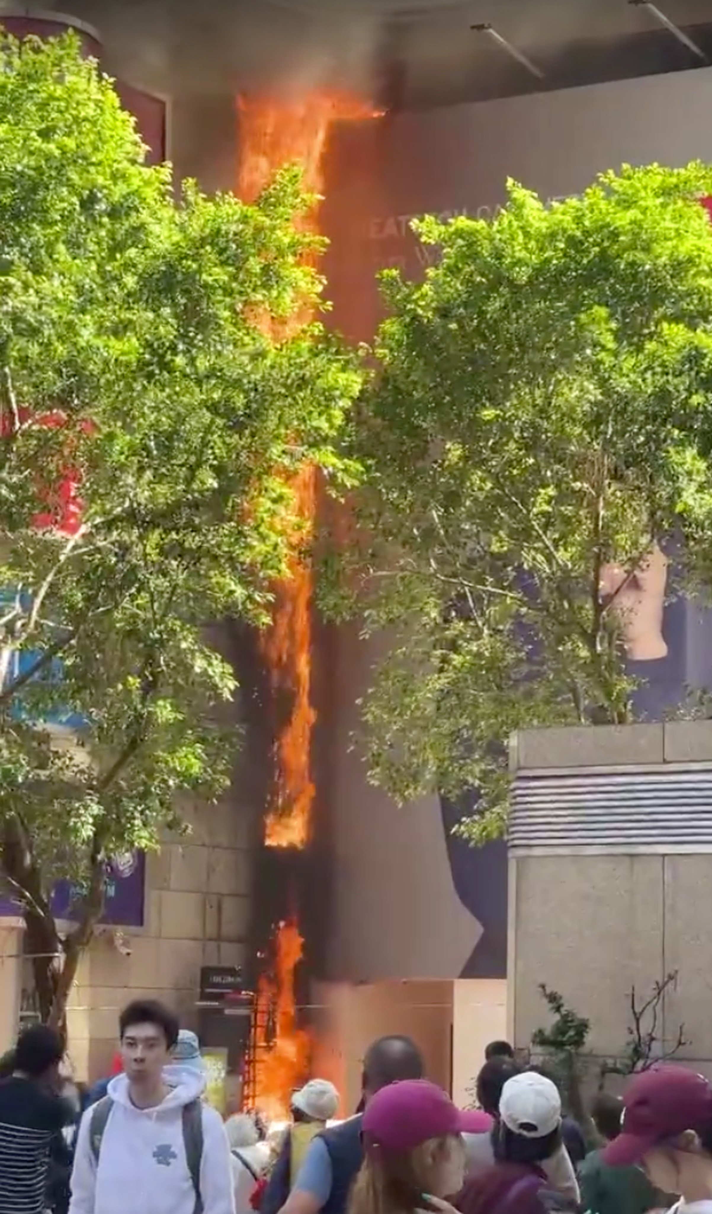 An exterior wall of a shopping centre in Hong Kong’s Causeway Bay caught fire during the lunch hour on Tuesday. Photo: Handout