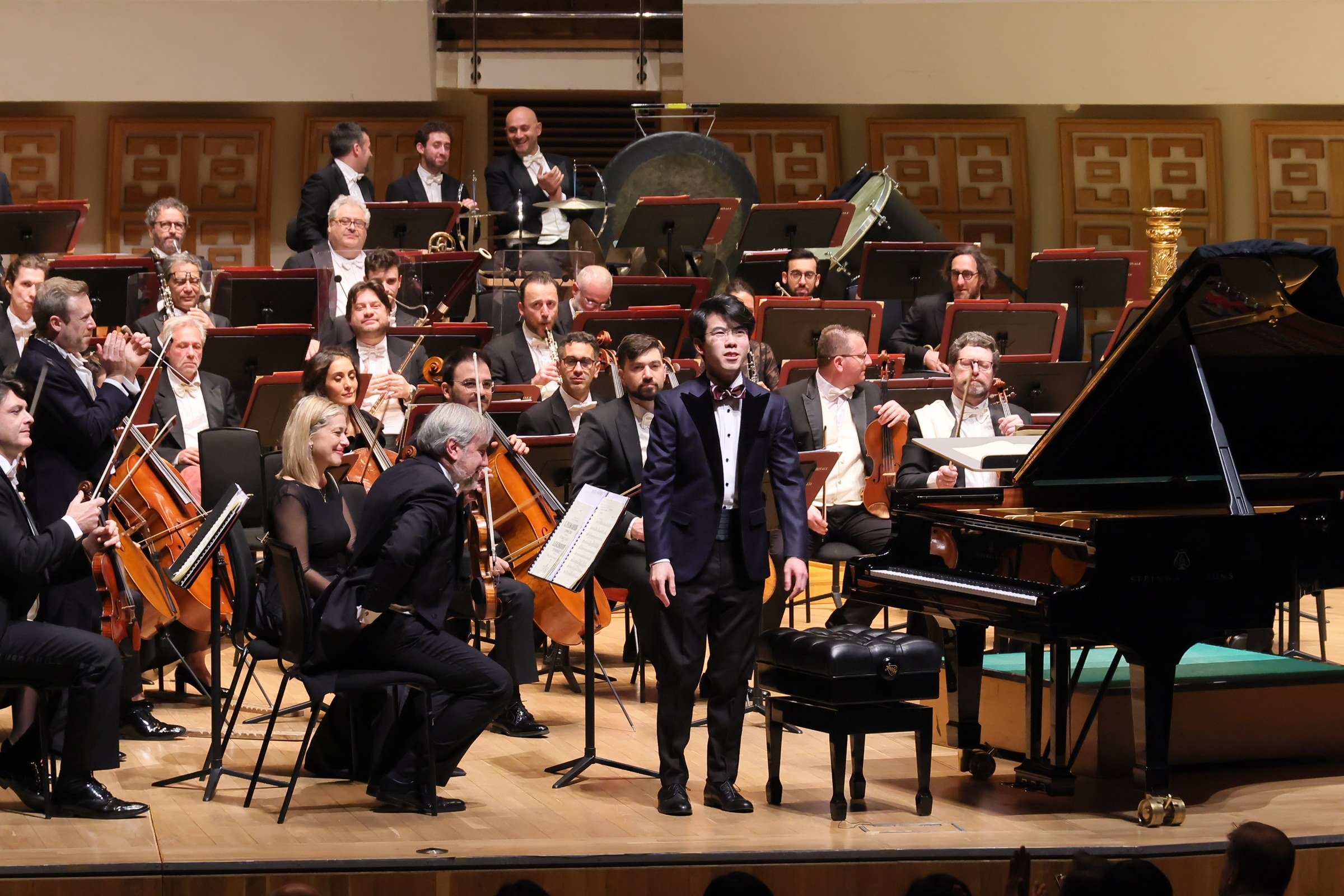 Aristo Sham stands on stage with the Orchestra dell’Accademia Nazionale di Santa Cecilia - Roma at the Hong Kong Cultural Centre Concert Hall on November 20, 2025. The Hong Kong pianist stepped in as the soloist in Ravel’s Piano Concerto in G, replacing Italian pianist Beatrice Rana, who had to cancel her visit. Photo: LCSD