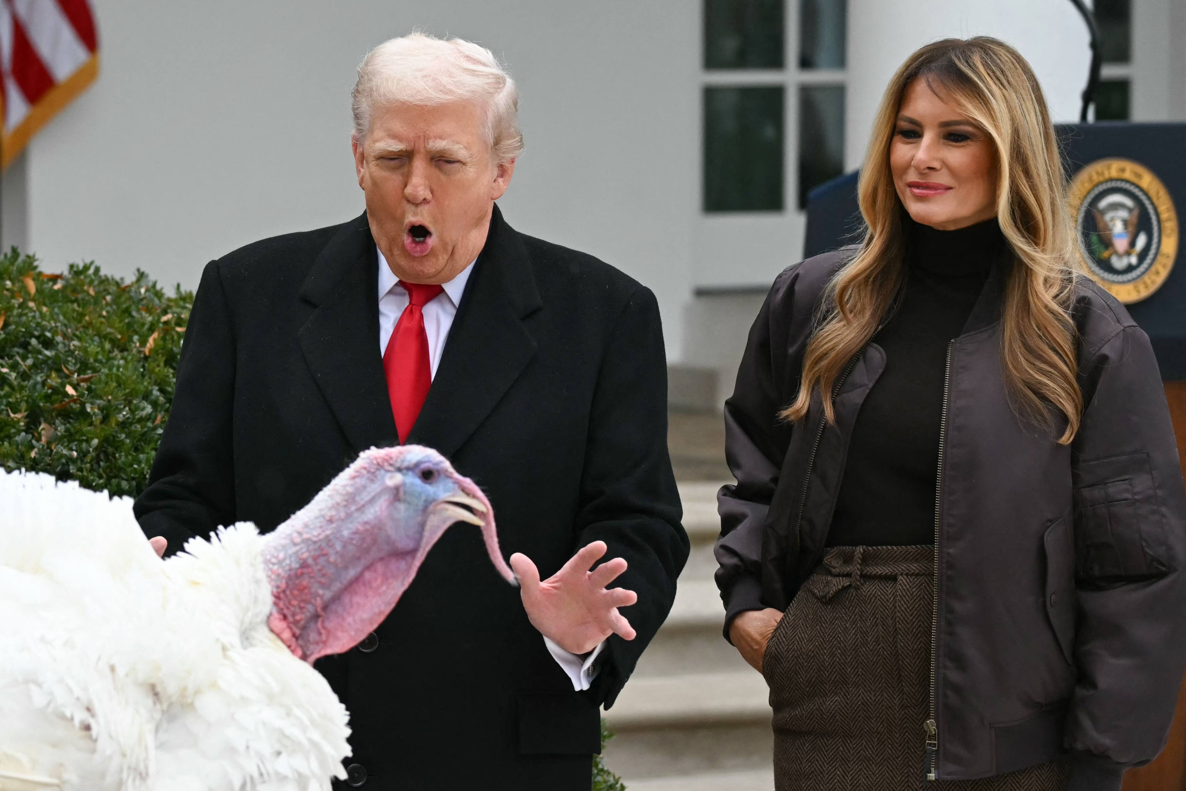 US first lady Melania Trump looks on as US President Donald Trump pardons Gobble the turkey at the White House on Tuesday. Photo: AFP
