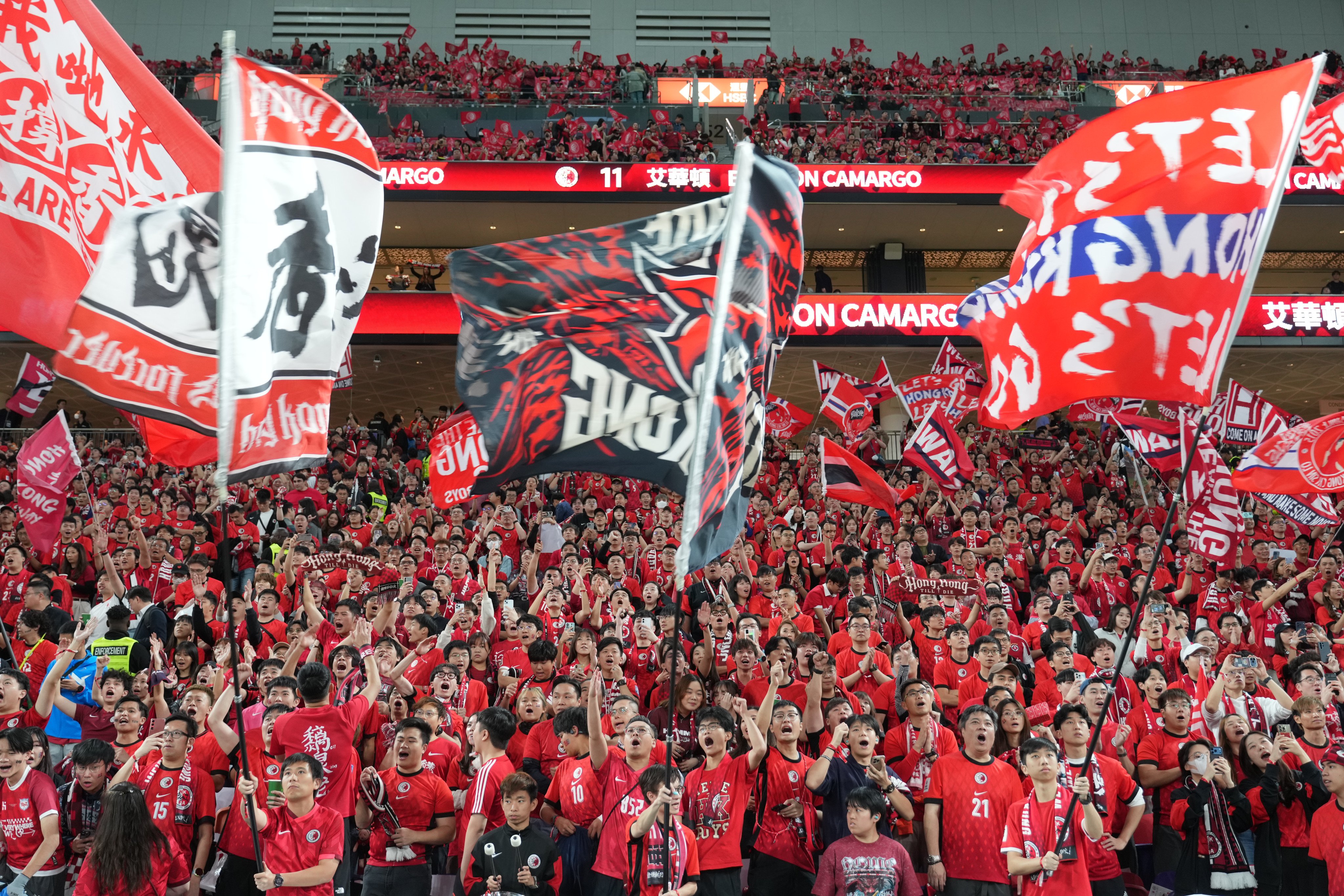Fans show their support for Hong Kong during the defeat by Singapore at Kai Tak Stadium. Photo: Sam Tsang