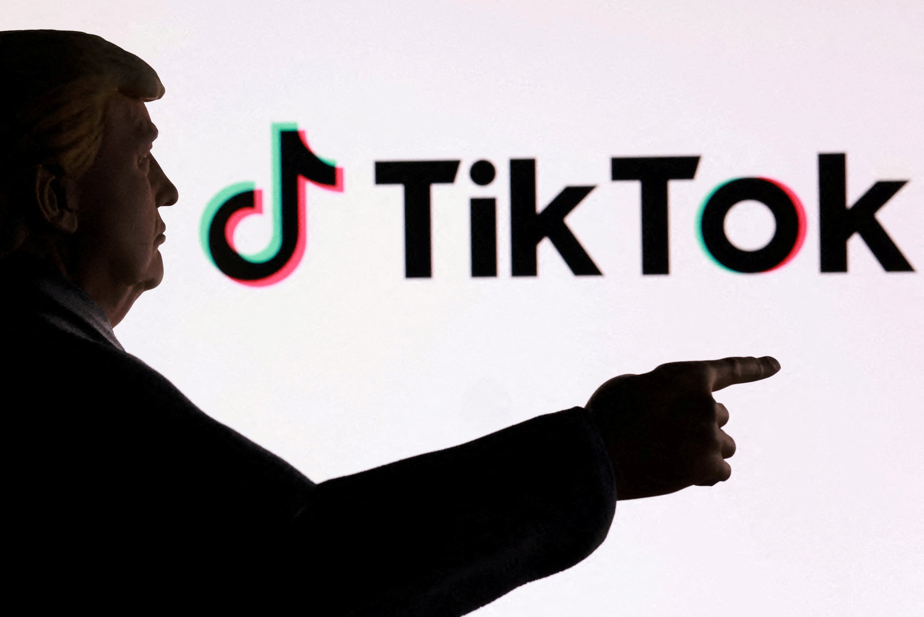 A 3D-printed miniature model depicting US President Donald Trump in front of the TikTok logo is shown in this illustration taken September 24, 2025. Photo: Reuters