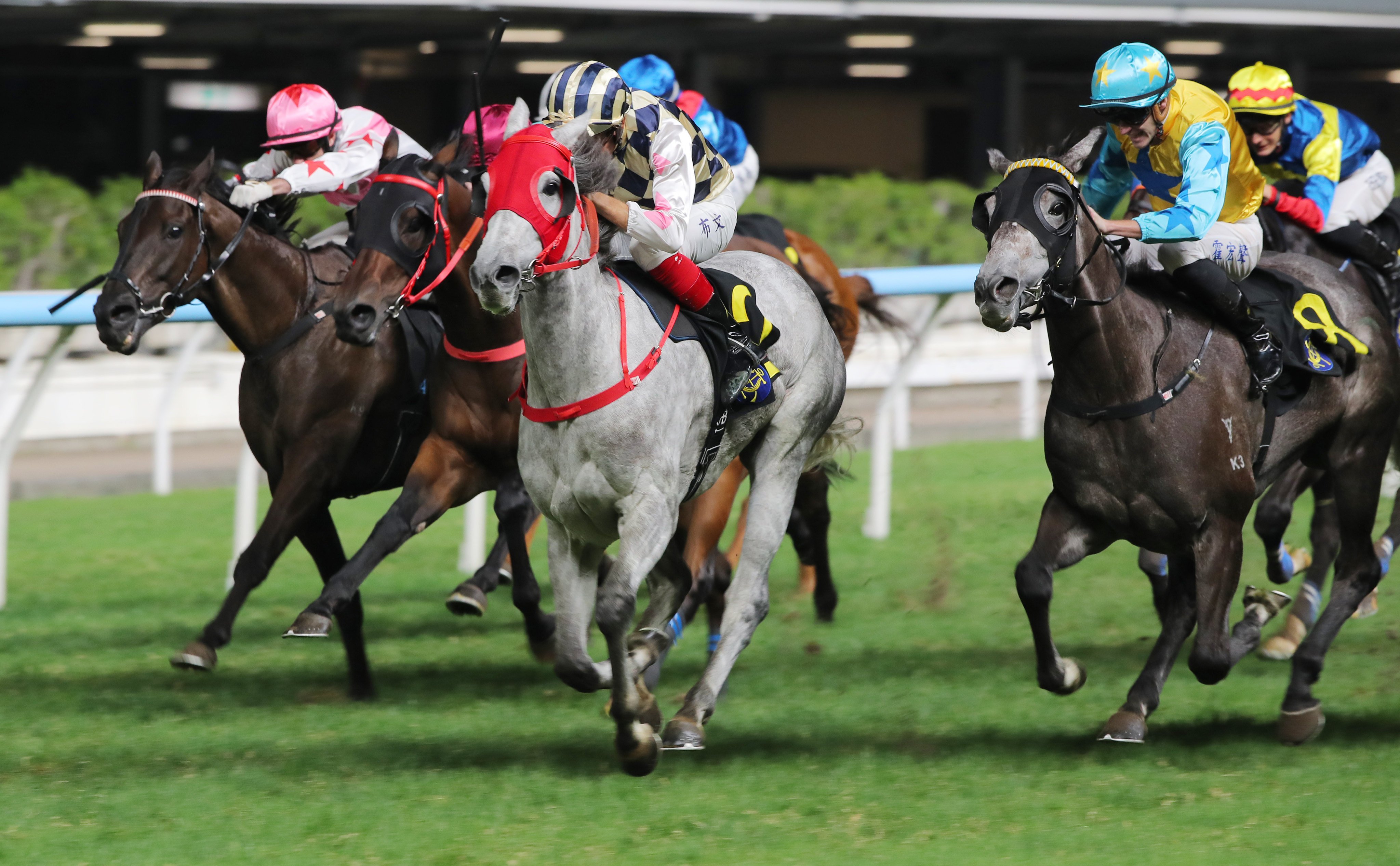 Allcash (grey) and Hugh Bowman win at Happy Valley. Photos: Kenneth Chan