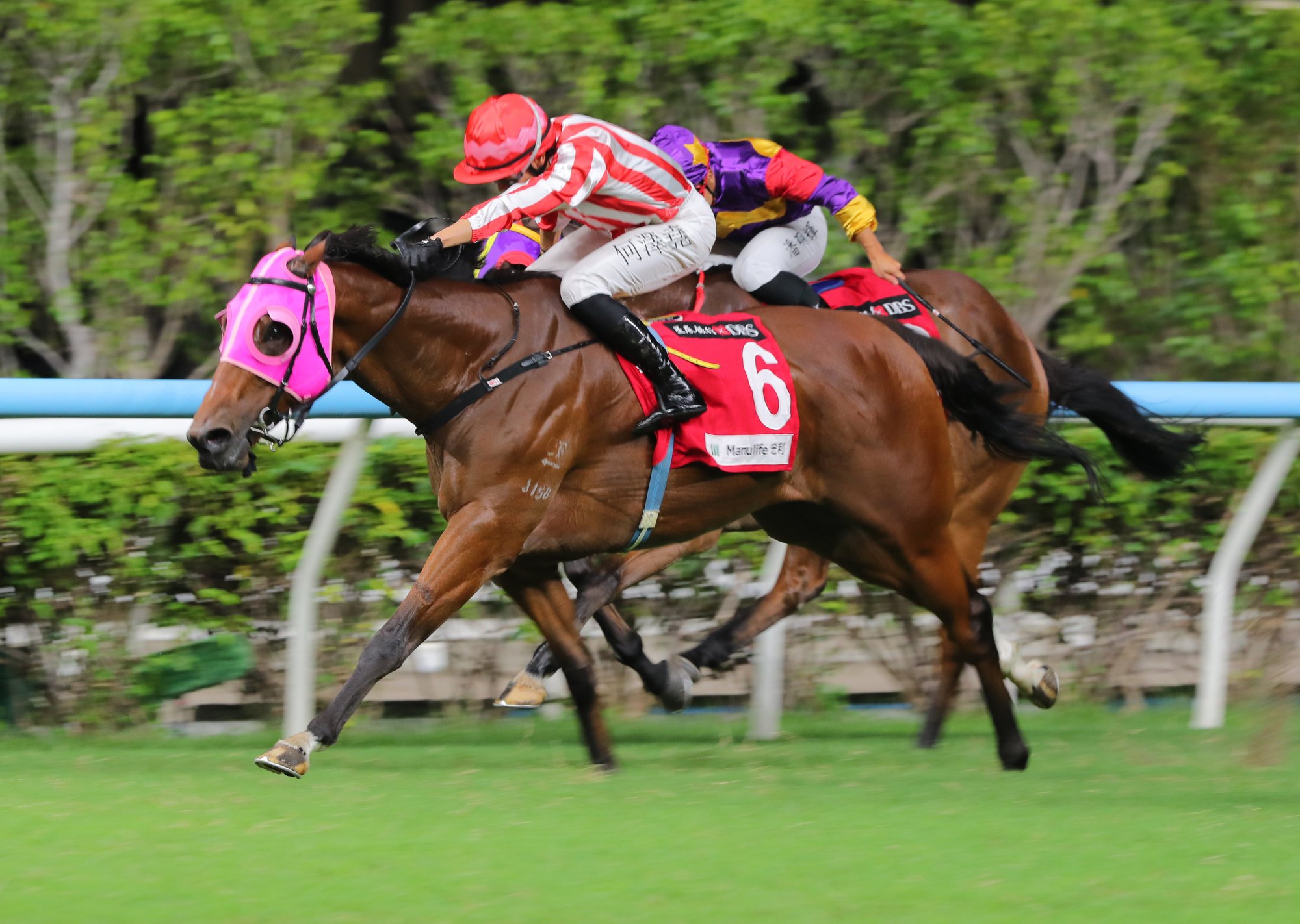Vincent Ho boots home King Miles at Happy Valley.