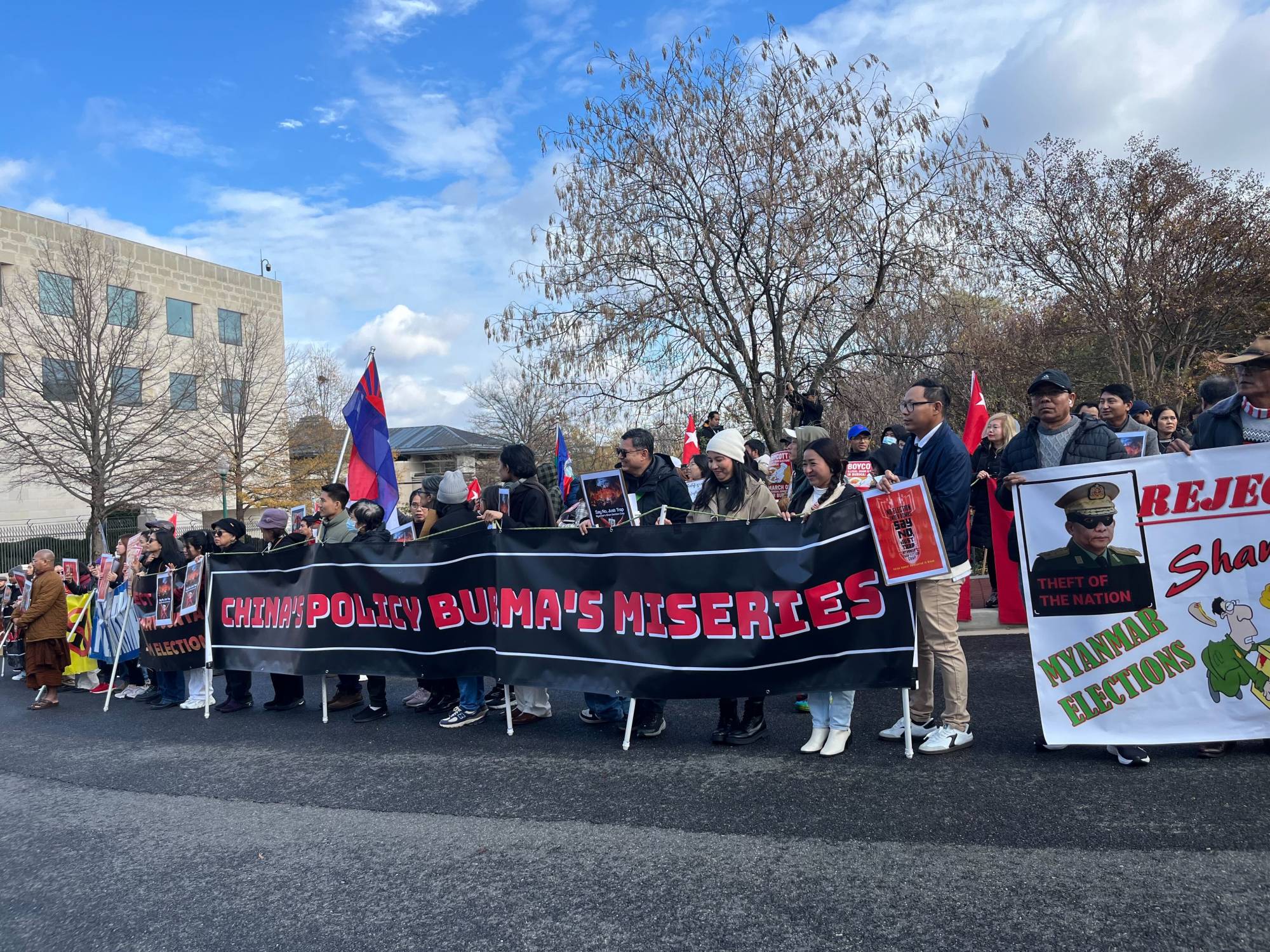 Demonstrators stand outside the Chinese Embassy in Washington on Saturday to protest Beijing’s support for the upcoming elections in Myanmar. Photo: Bochen Han