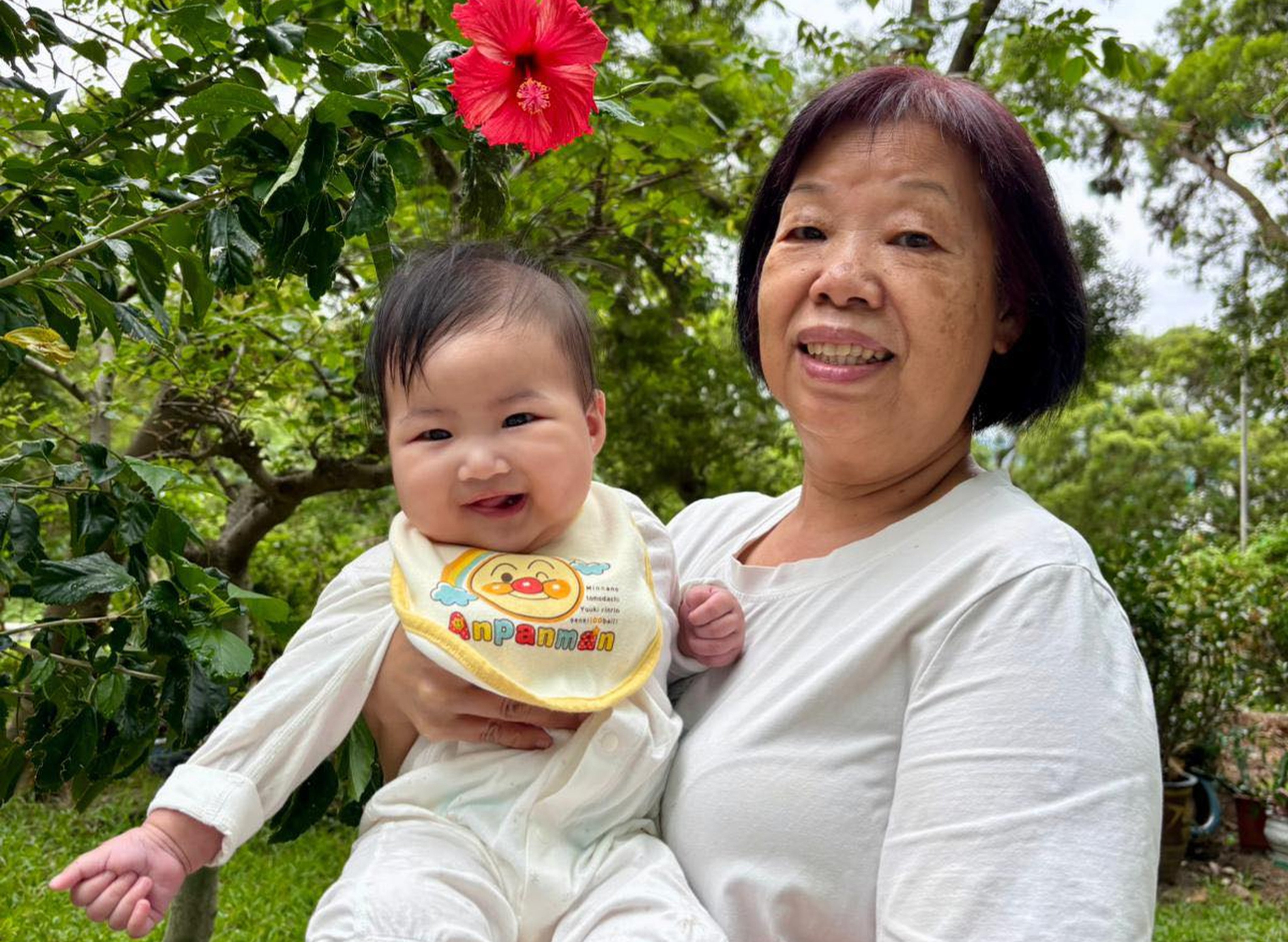 Six-month-old Ho Tsz-yan and her grandmother. Photo: Handout