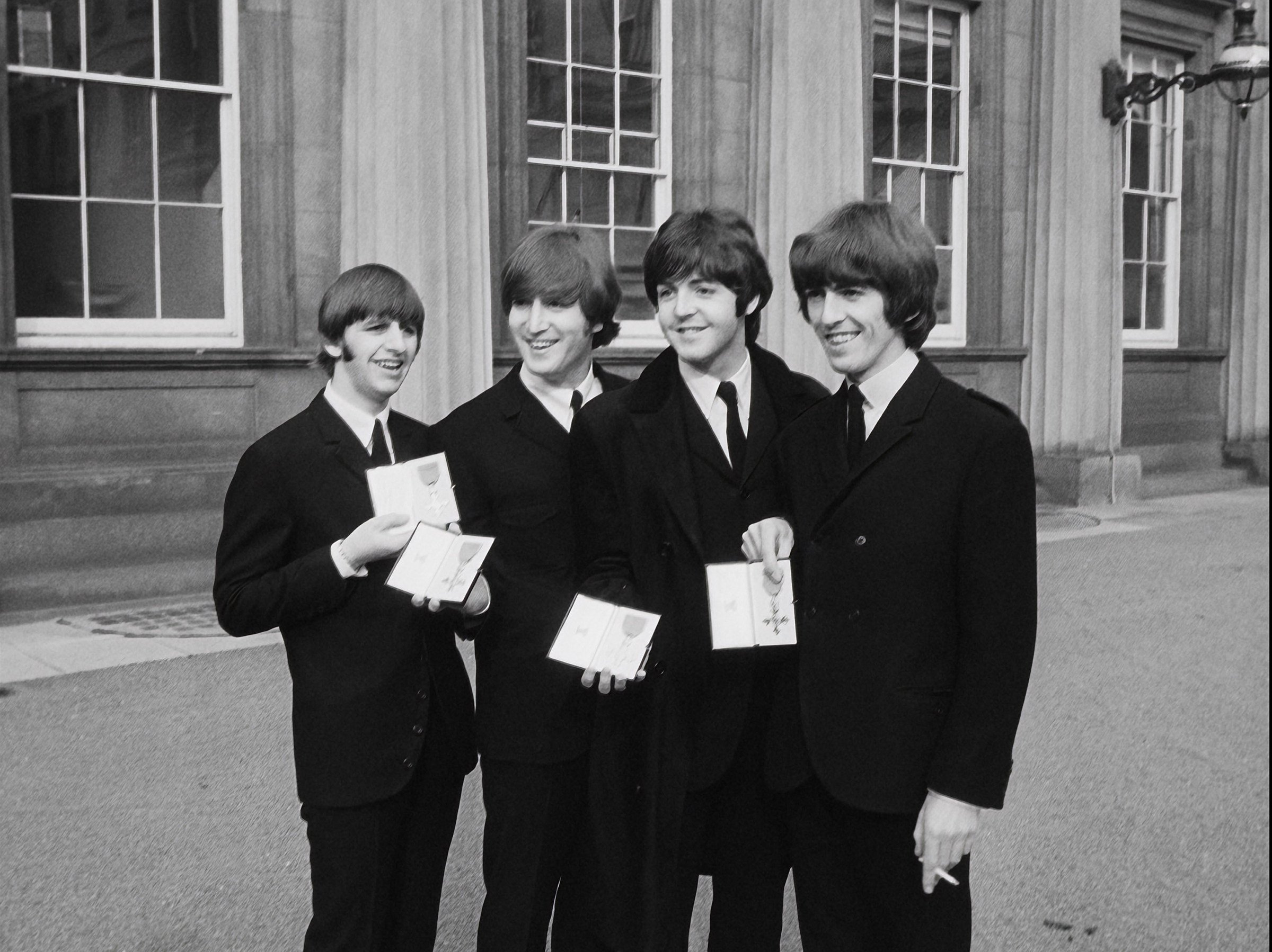 The Beatles visit Buckingham Palace to receive their MBEs in 1965, as seen in the remastered The Beatles Anthology. Photo: TNS