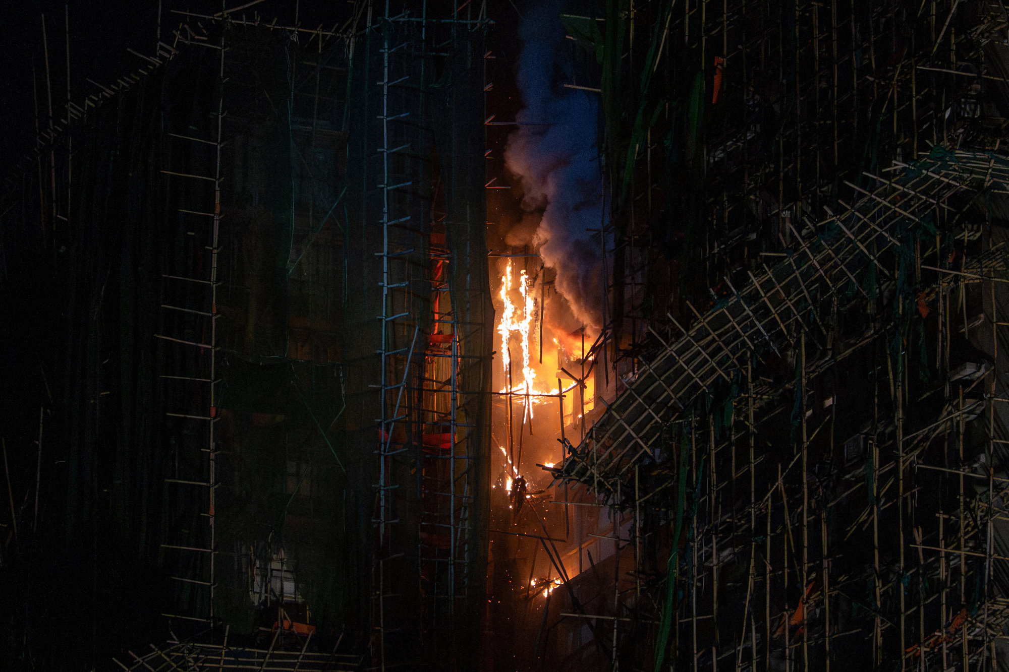 A fire continues to burn a second day after the fire at Wang Fuk Court. Photo: AP