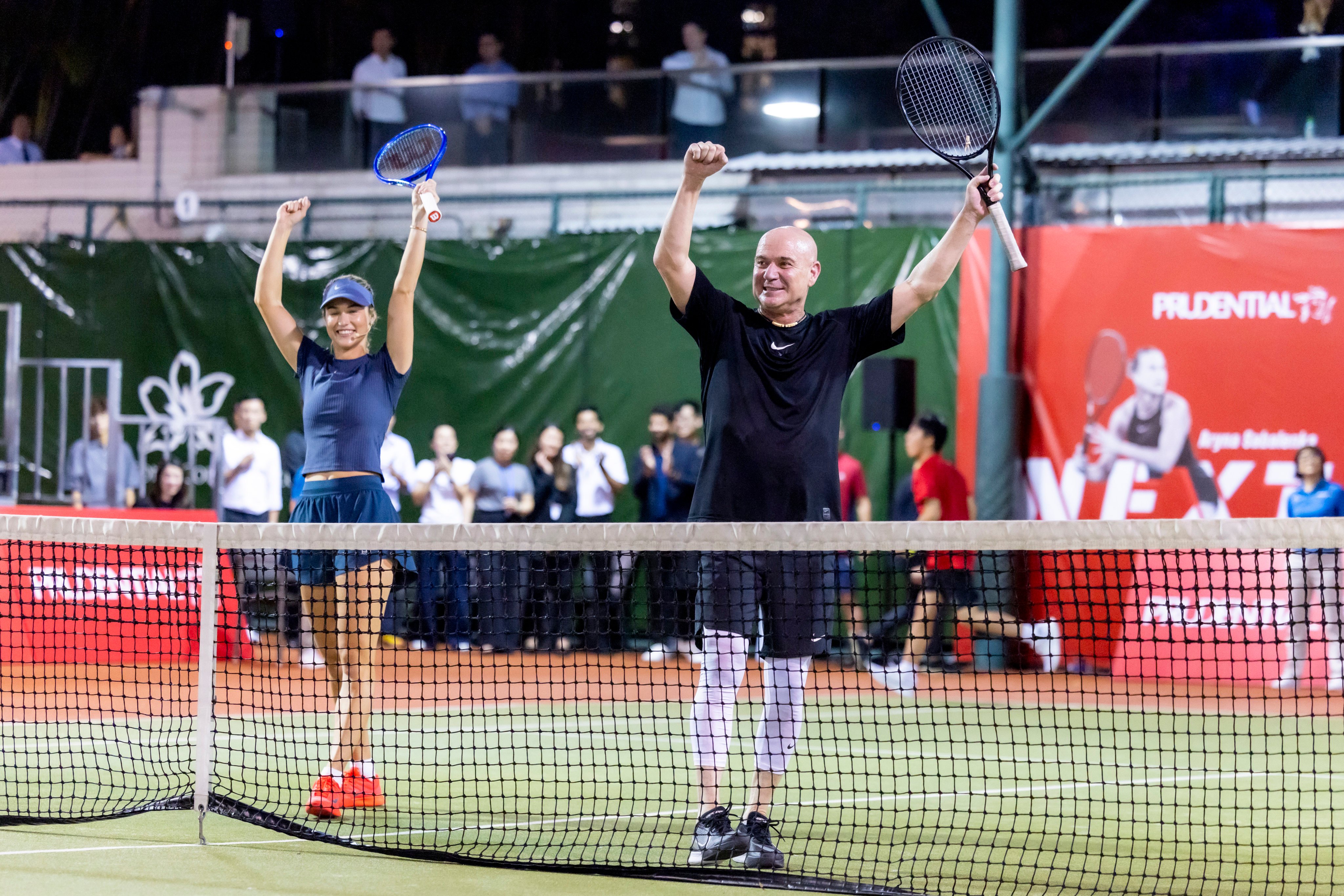 Andre Agassi and Anna Kalinskaya celebrate during a doubles match against Aryna Sabalenka and Justin Gimelstob at the Prudential NextGen Aces 2025 event in Hong Kong. Photo: courtesy NextGen Aces 2025