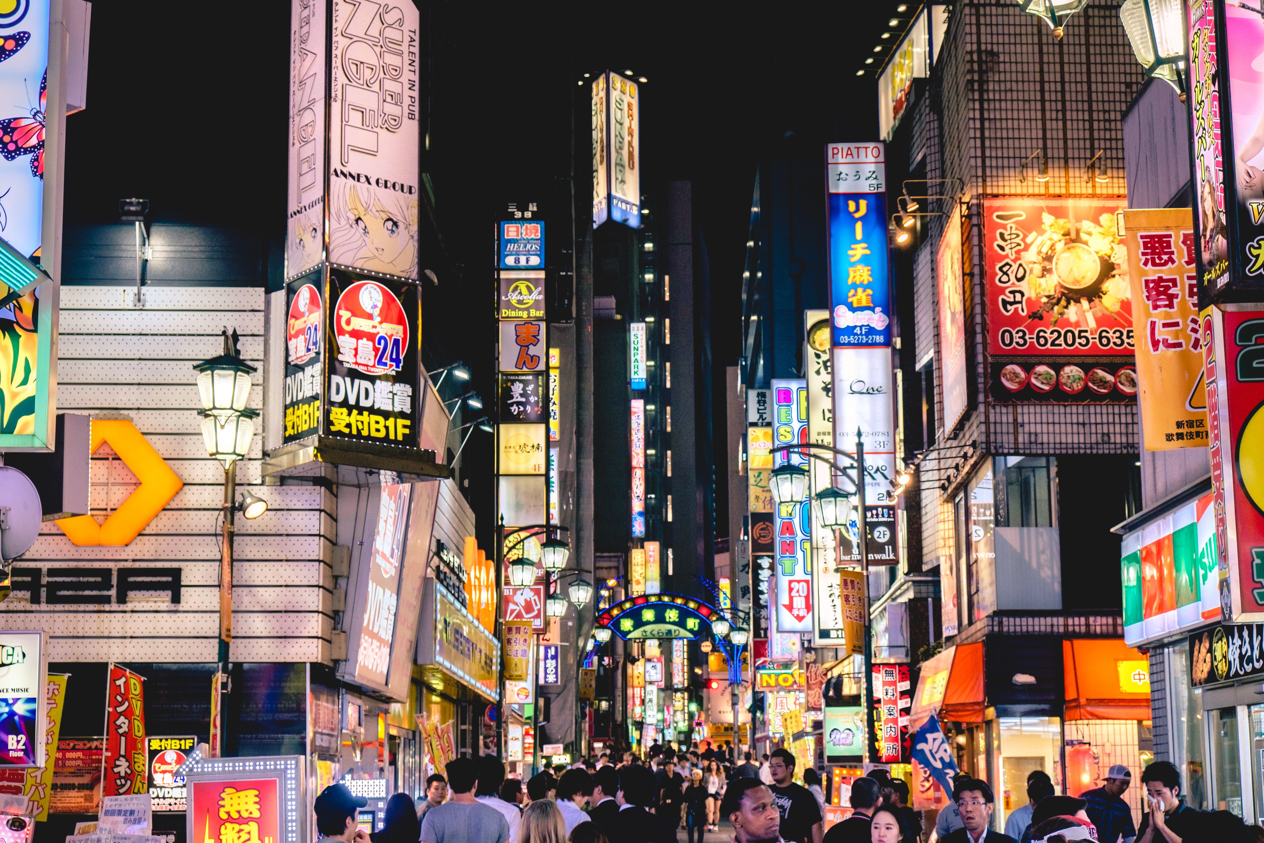 People walk through Tokyo’s Shinjuku district, a major nightlife and shopping area popular with visitors. Photo: Shutterstock