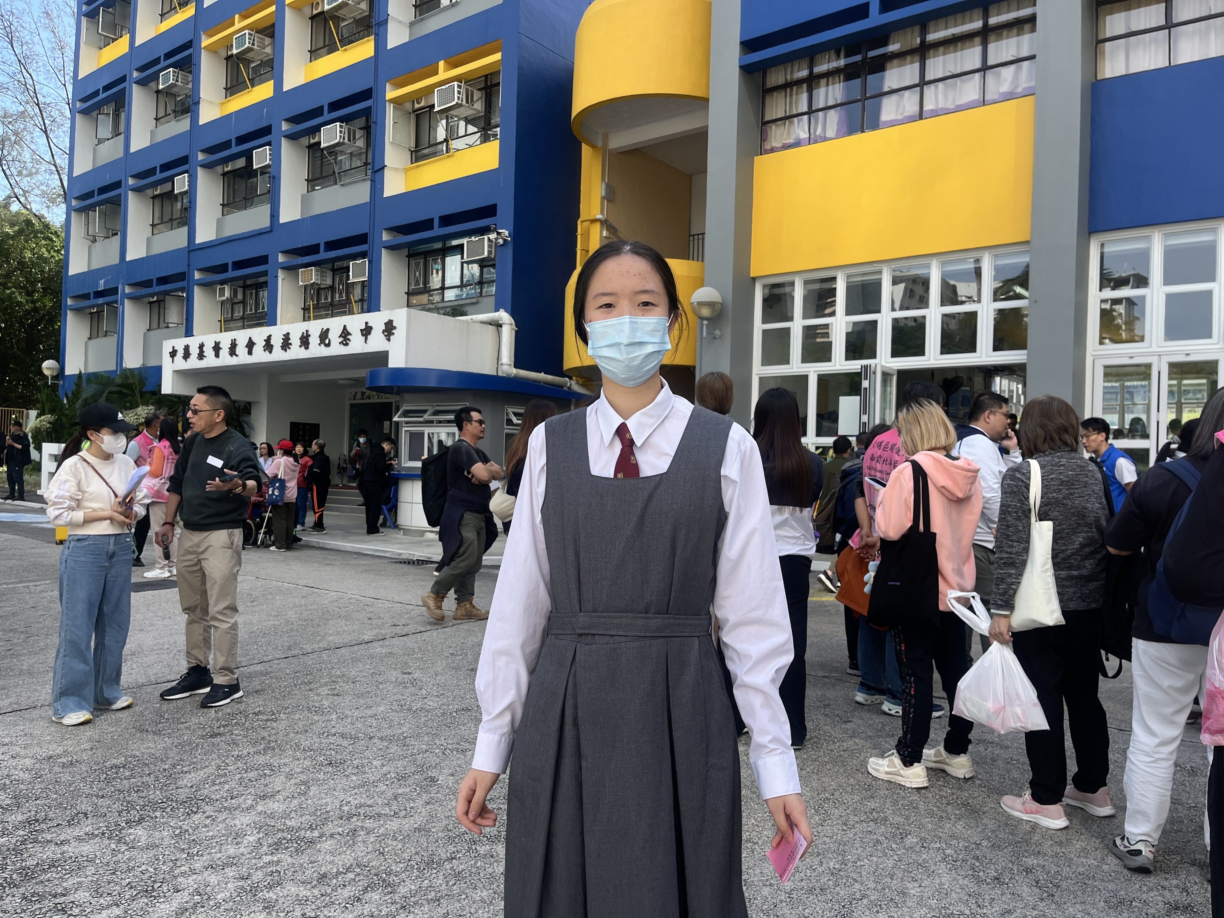 At a school that was turned into a shelter, Susan Huang and her classmates from Wong Shiu Chi Secondary School volunteer to help victims of the fire. Photo: Kelly Fung