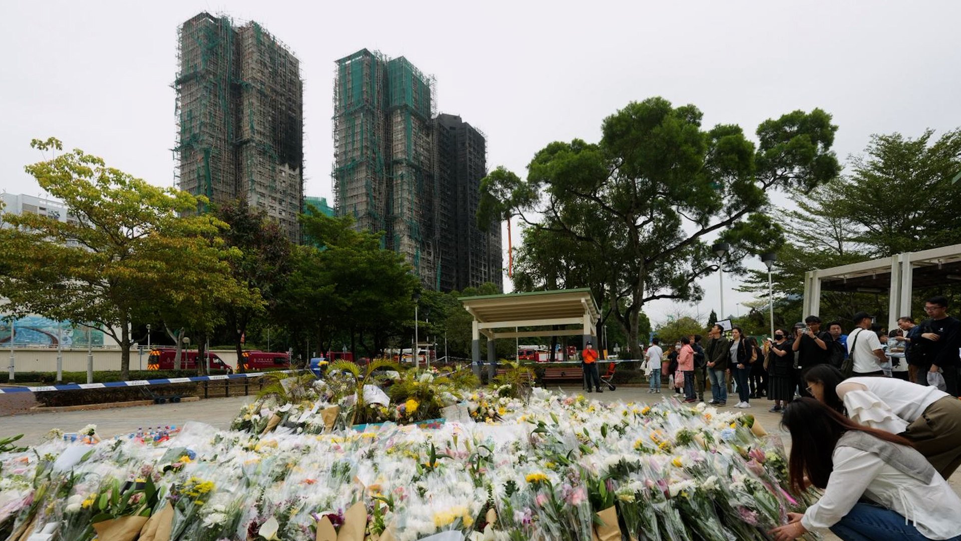 A sitting area opposite the housing estate in Tai Po has become an impromptu altar