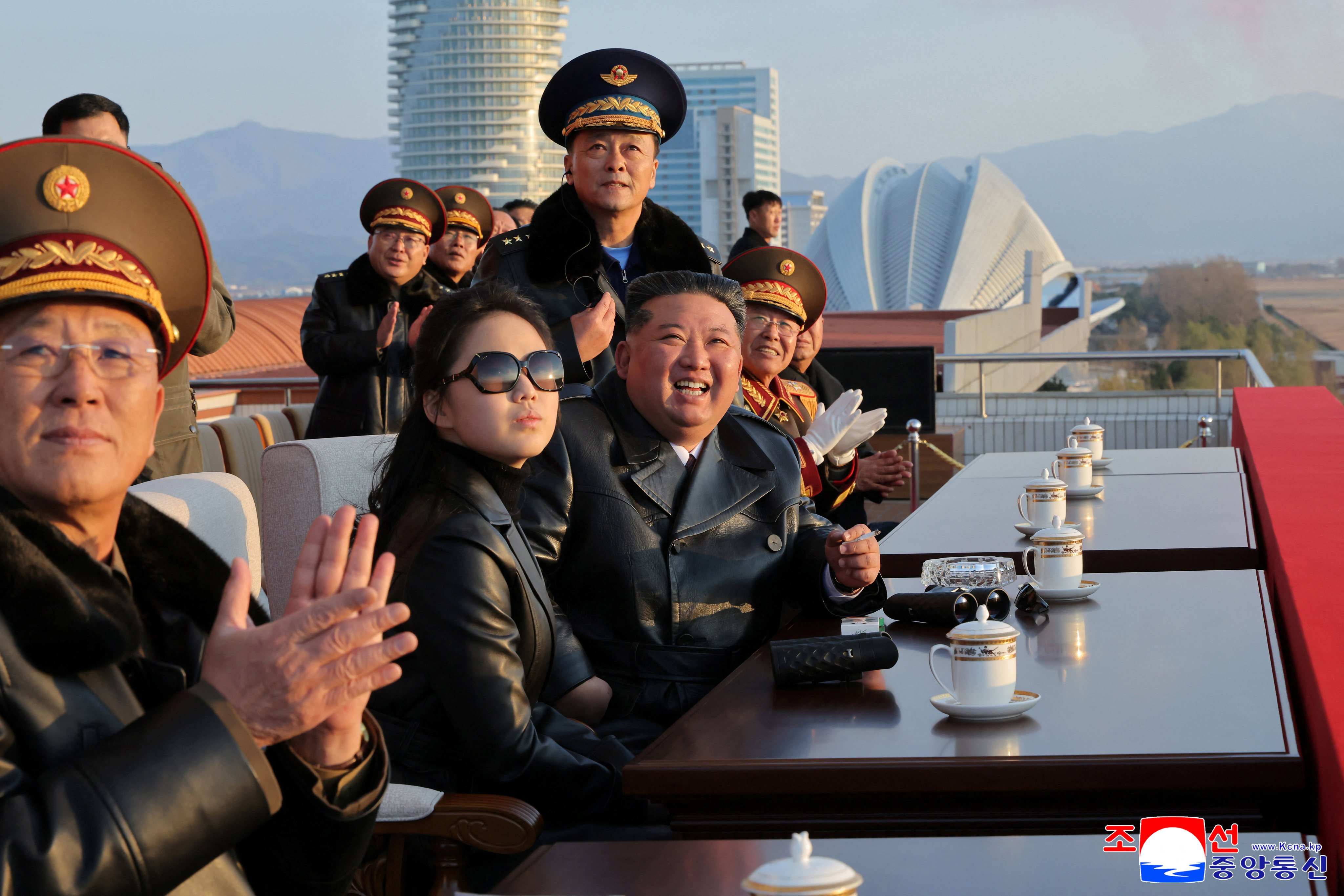 North Korean leader Kim Jong-un and his daughter, Ju-ae, watch an air show during an event to celebrate the Air Force’s 80th anniversary in Wonsan on Friday. Photo: KCNA/Reuters