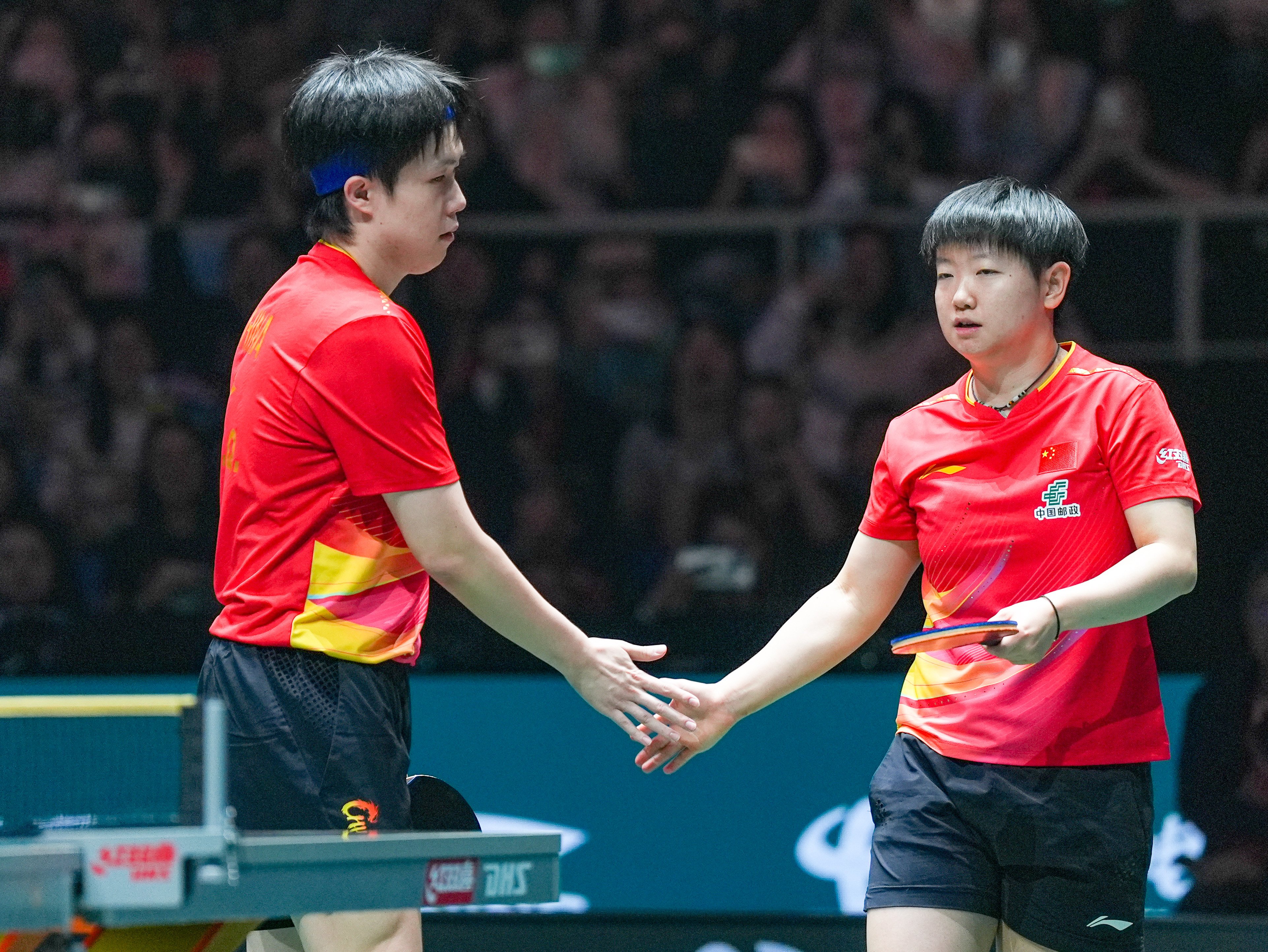 Wang Chuqin and Sun Yingsha (right) got China off to a winning start. Photo: Xinhua
