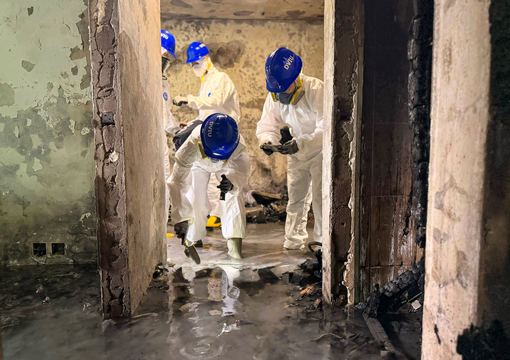 The Disaster Victim Identification Unit searched one of the affected buildings. Photo: handout