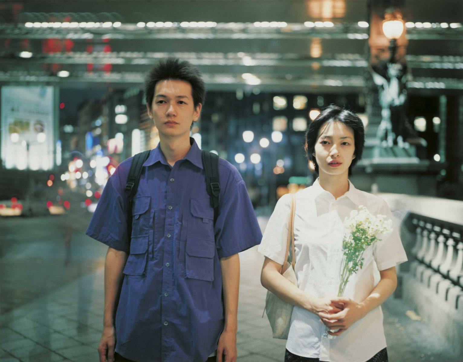 Arata Iura (left) and Ryo in a still from Distance (2001), which was conceived in the aftermath of the sarin gas attack on the Tokyo subway system, carried out in March 1995 by the Aum Shinrikyo doomsday cult.