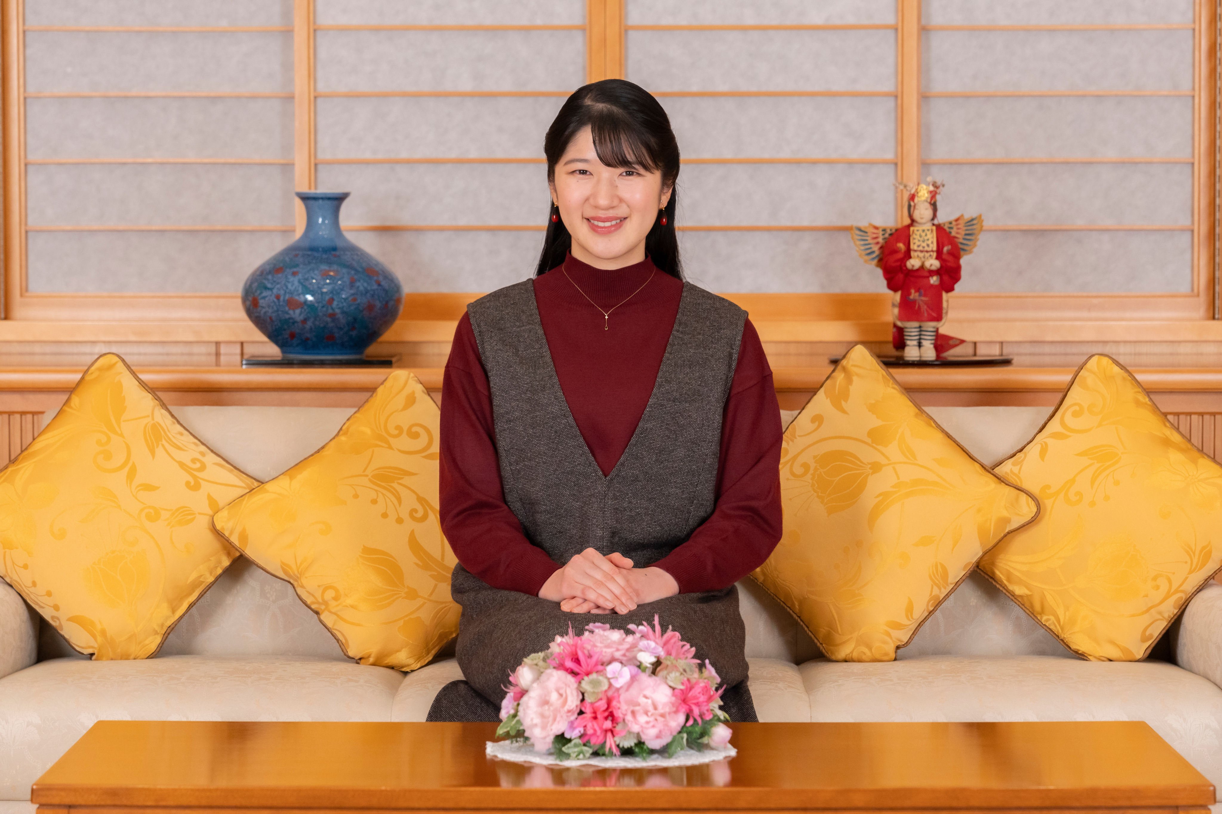 Princess Aiko, daughter of Japan’s Emperor Naruhito and Empress Masako, poses for a photo at the Imperial Palace on November 7. Photo: Imperial Household Agency of Japan/AP